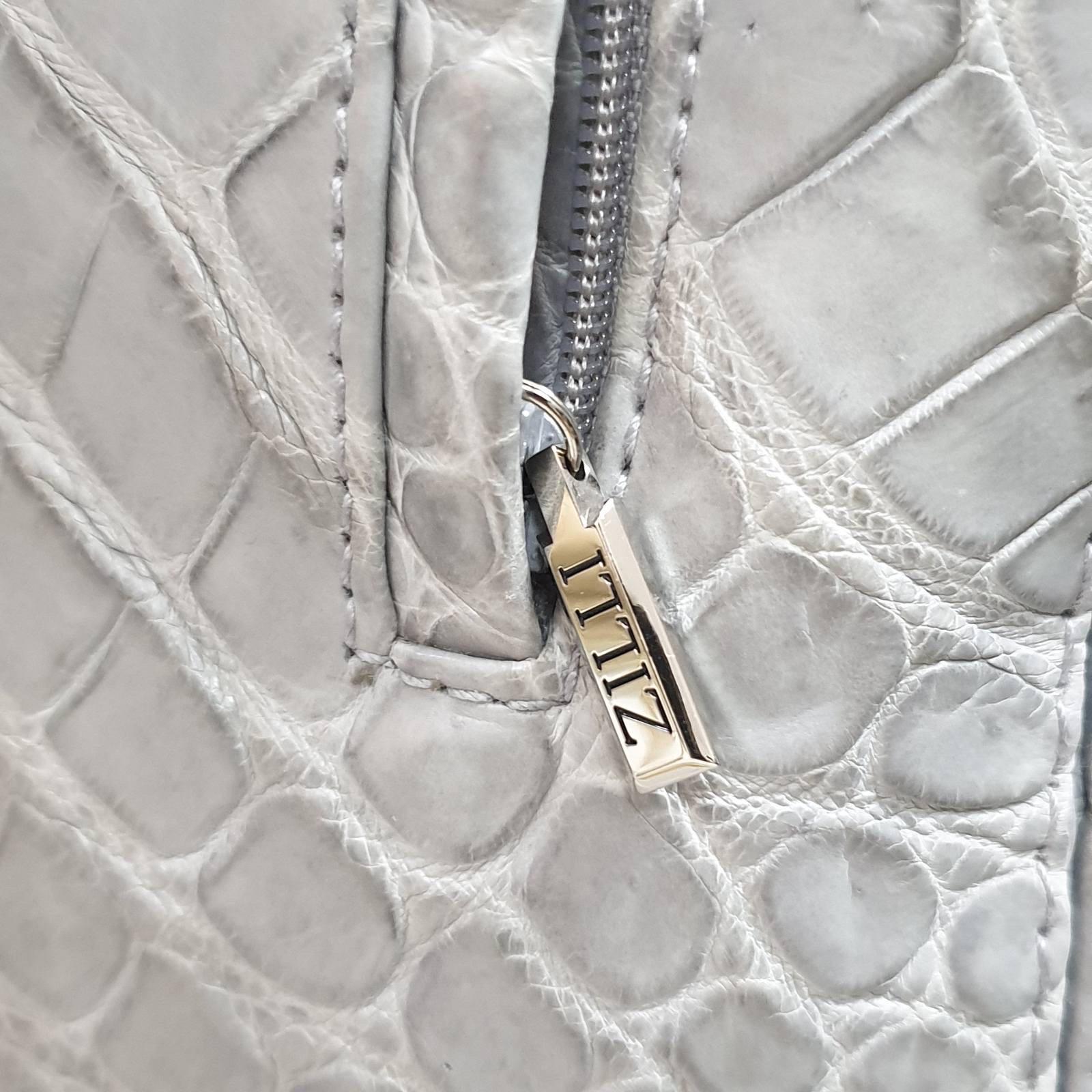 Retail price was 70 000 euros
Personalised jacket.
Name tag can be removed.
Individual order in Paris Zilli boutique
Very good condition.
Slight dirtiness seen on pics. Not very visible
Sz.40