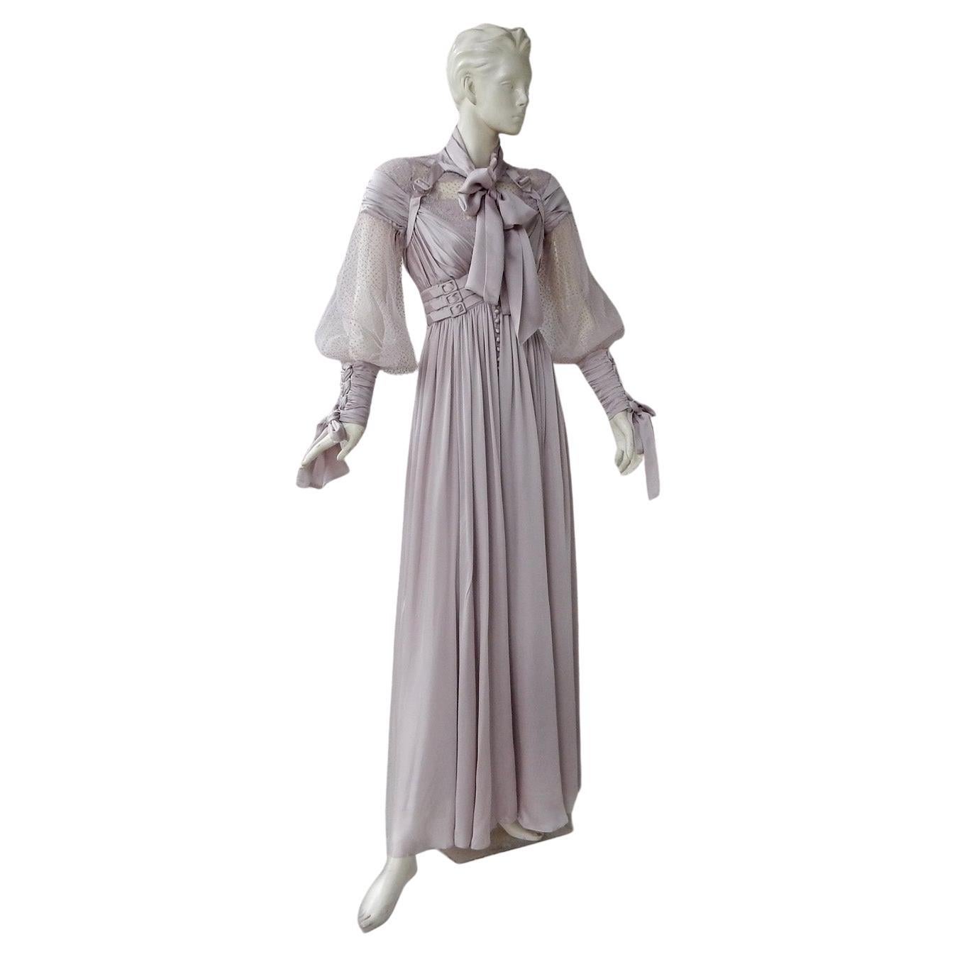 One of Zimmerman's most stunning runway gowns.  Angelic and ethereal silk dress fashioned of light lilac with silver hues.  Features elaborate detailing with feminine style harness; wonderful drape and highly fashionable bishop sleeves detailed at