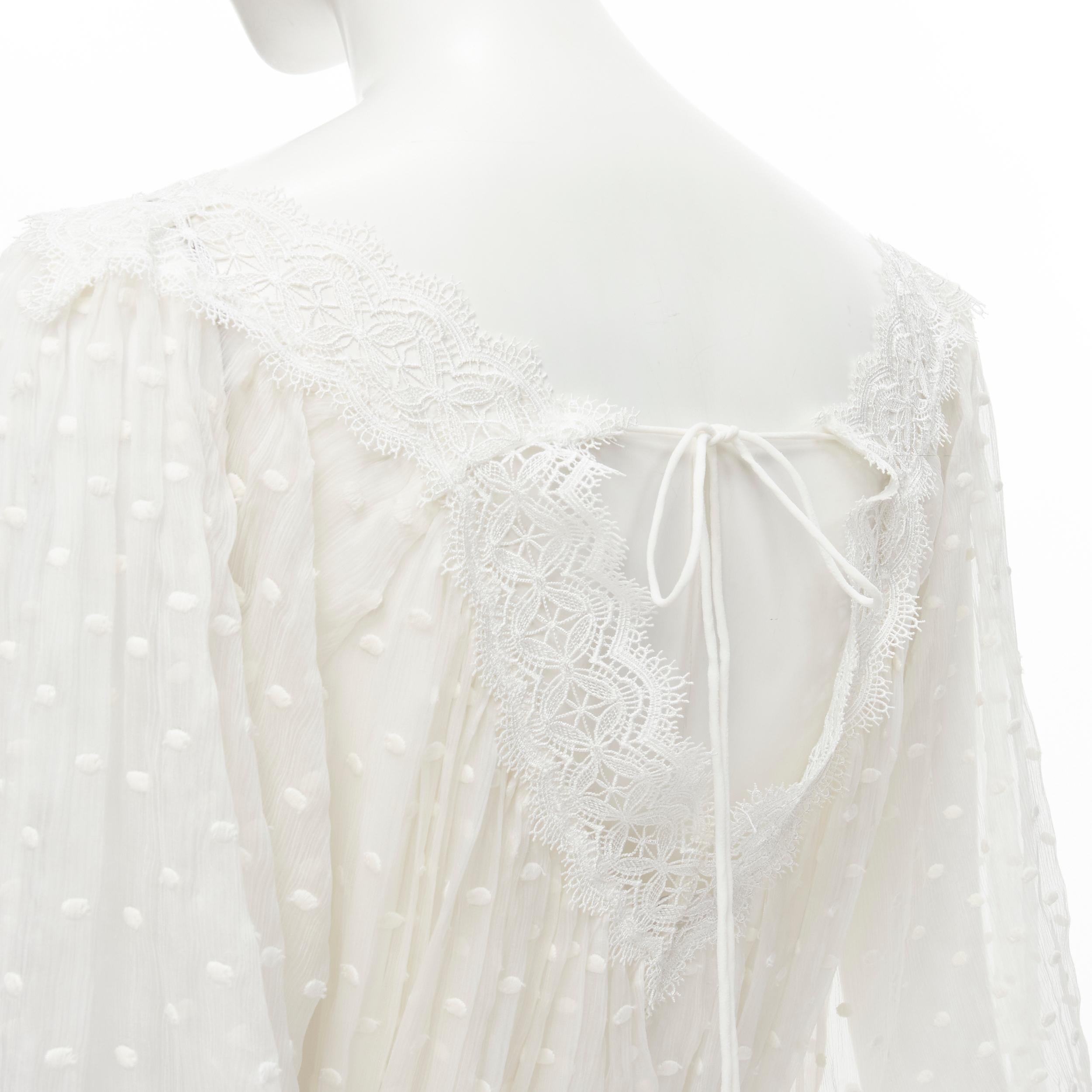 ZIMMERMAN white lace trim polka dot embroidery semi sheer boho dress US0 XS 
Reference: LNKO/A01846 Brand: Zimmerman 
Material: Silk 
Color: White 
Pattern: Solid 
Extra Detail: Lace trim V-neckline. Tie straps. Rope tie belt. Bubble sleeve. 
Made