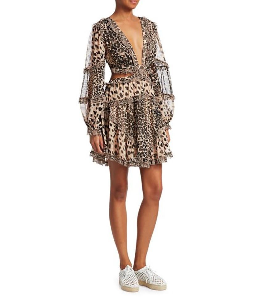 
ZIMMERMANN 

Allia Cut Out Short Dress in Spliced from our Summer Swim 2019 Collection.
A lightweight mini dress featuring cut out panels and ruffle detailing throughout. 
A-line mini dress 
Blouson sleeves with elasticated cuffs 
Ruffles