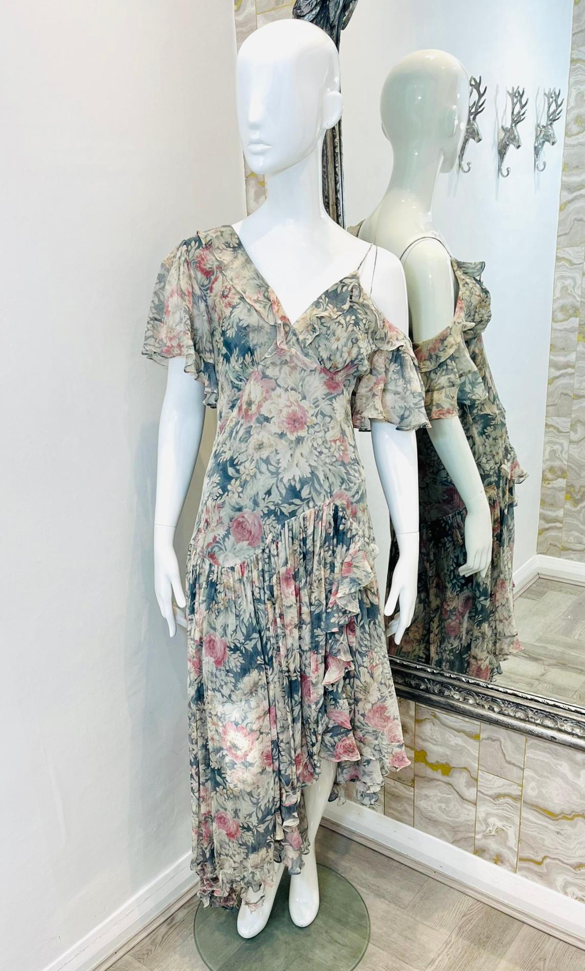 Zimmermann Asymmetric One-Shoulder Silk Dress

Grey green 'Cavalier' midi dress designed with floral print throughout.

Featuring frill detailing to the short sleeve and flared, pleated skirt.

Styled with spaghetti strap to one shoulder and front