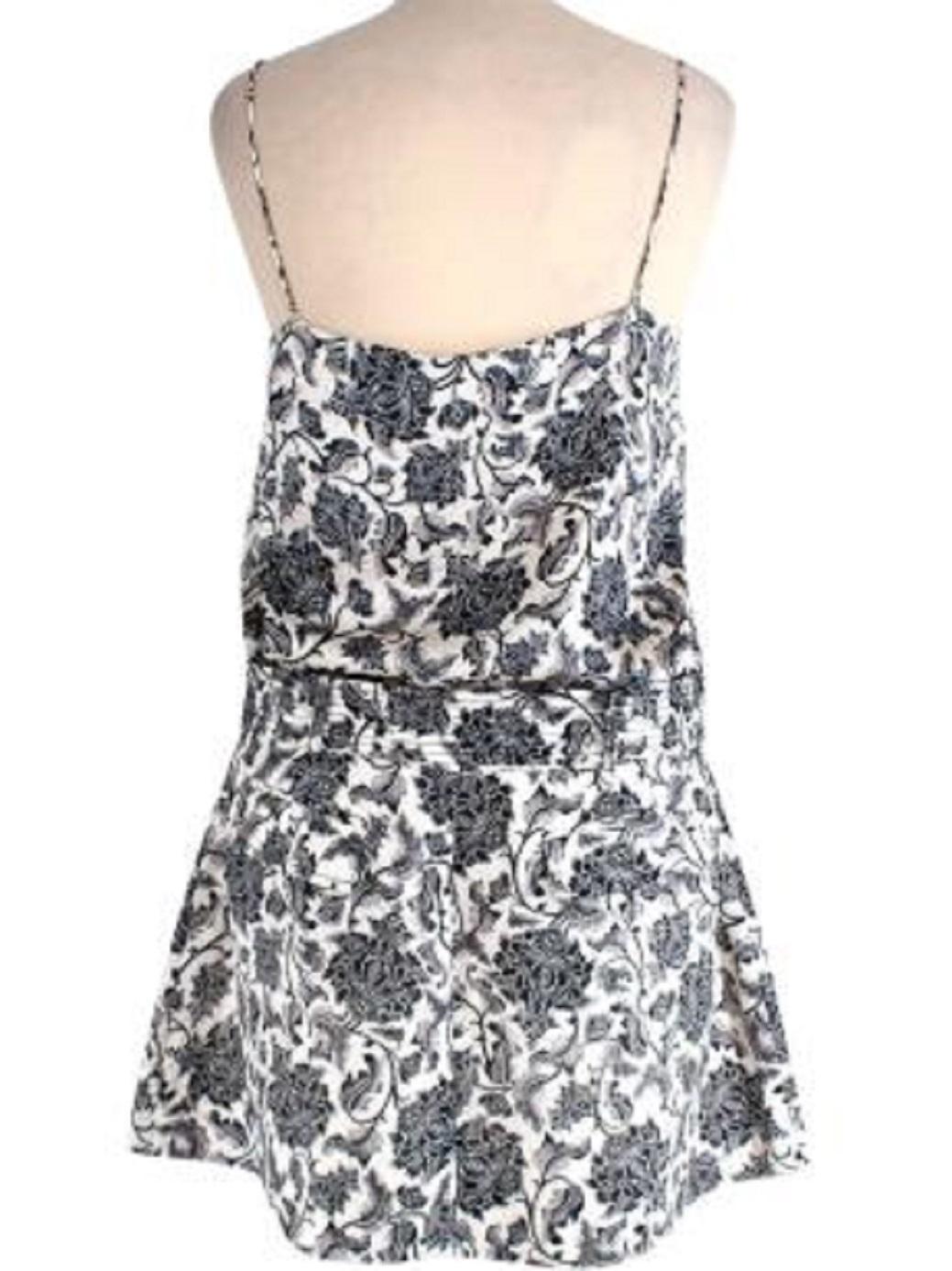 Zimmermann Black & ivory toile print silk-satin camisole & linen skirt

- Made of luscious linen. 
- Perfect fitting camisole and skirt.
- Skirt has 2 front and 1 back pockets.
- Belt feature with the skirt.
- Floral print on both camisole and