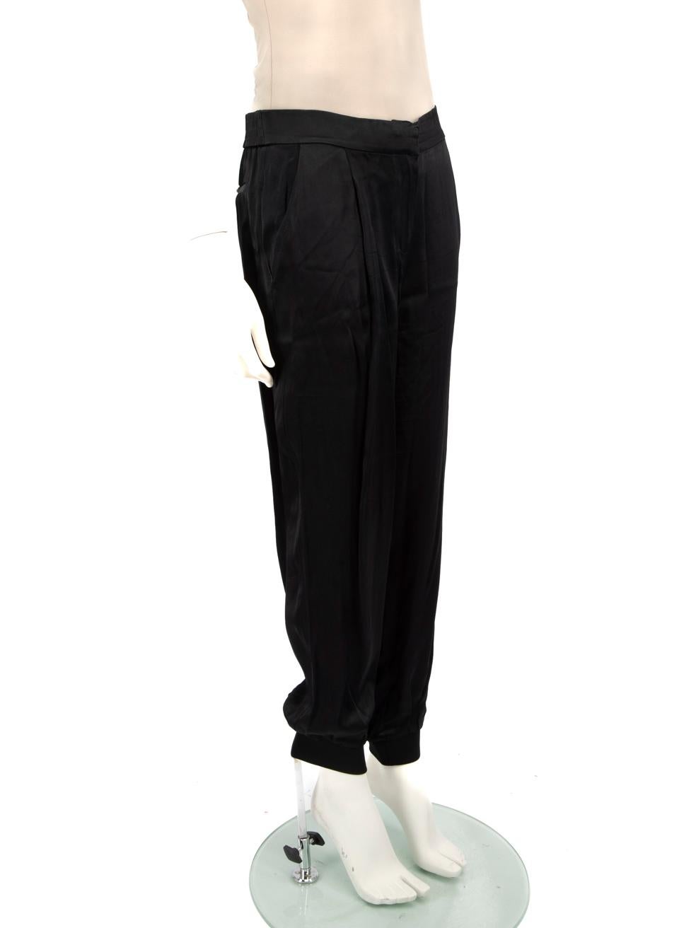 CONDITION is Very good. Minimal wear to trousers is evident. Minimal wear to the brand label which is partly detached on this used Zimmermann designer resale item.
 
 Details
 
 
 Black
 
 Viscose
 
 Trousers
 
 Tapered
 
 Stretchy
 
 High rise
 
