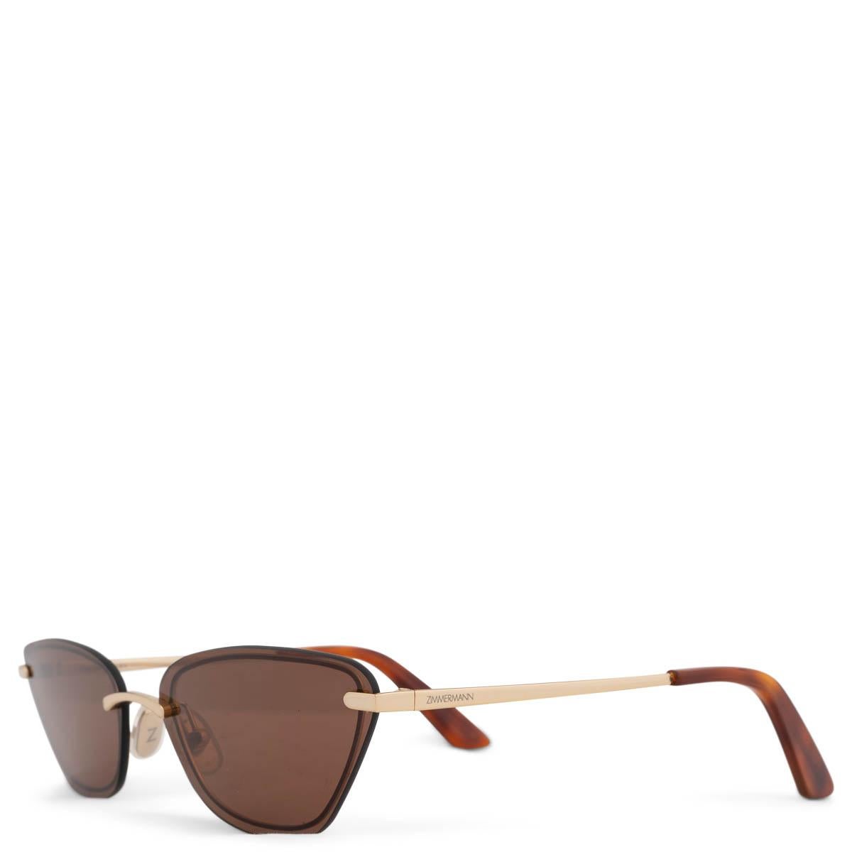 100% authentic Zimmermann Uptempo cat eye sunglasses in Havana brown. A classic cat-eye shape featuring a micro acetate frame and gold-tone temples with tonal lenses. Havana lens is category 2. Has been worn and is in excellent condition. Come with