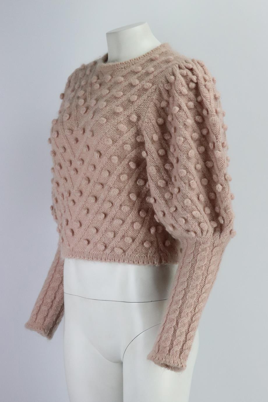 Zimmermann cable knit wool blend sweater. Made from pink cable-knit with wool and mohair with baubles. Pink. Slips on. 41% Polyamide, 34% wool, 25% mohair. Size: 3 (UK 14, US 10, FR 42, IT 46). Bust: 35.5 in. Waist: 33 in. Hips: 33.5 in. Length: 18
