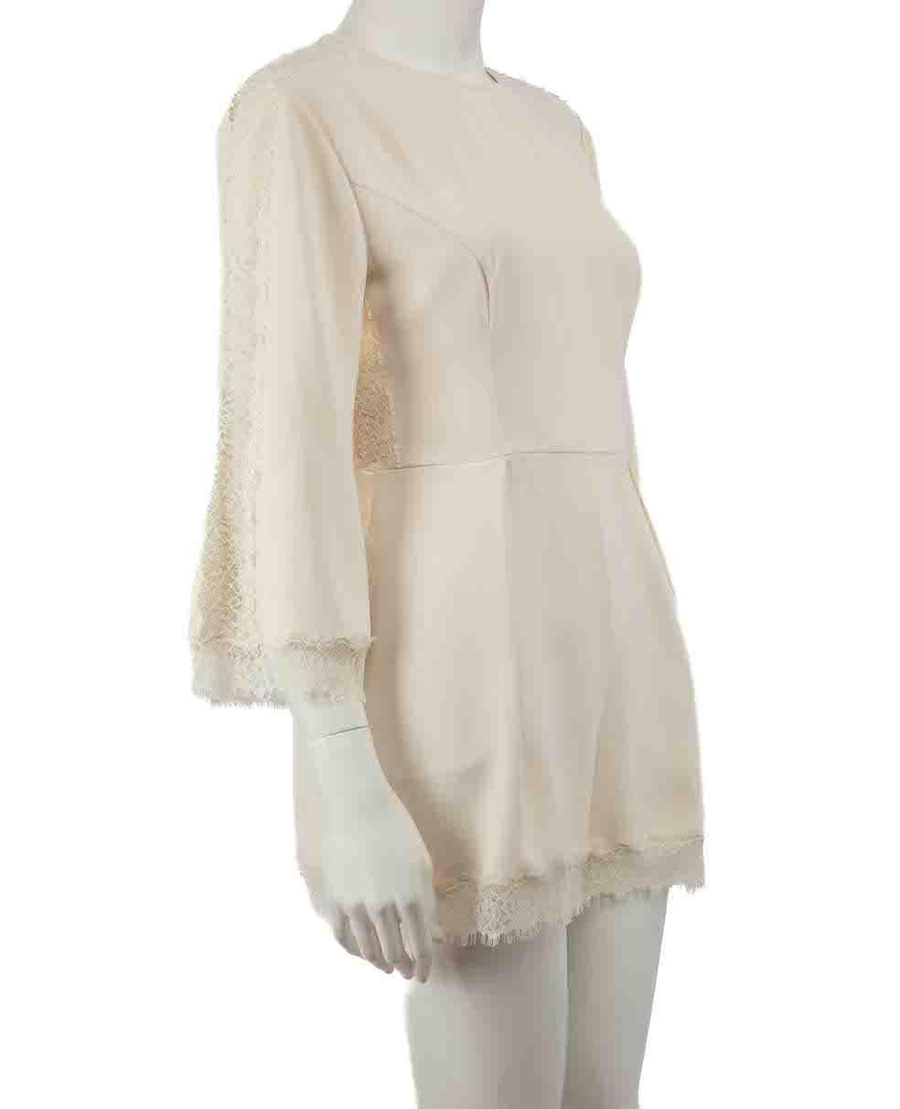 CONDITION is Very good. Hardly any visible wear to jumpsuit is evident on this used Zimmermann designer resale item.
 
 Details
 Ecru
 Polyester
 Playsuit
 Round neck
 Long sleeves
 Lace trim
 2x Side pockets
 Back zip and hook fastening
 
 
 Made