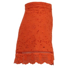 Pantalones cortos de cintura alta con ojales de Zimmermann, de algodón naranja