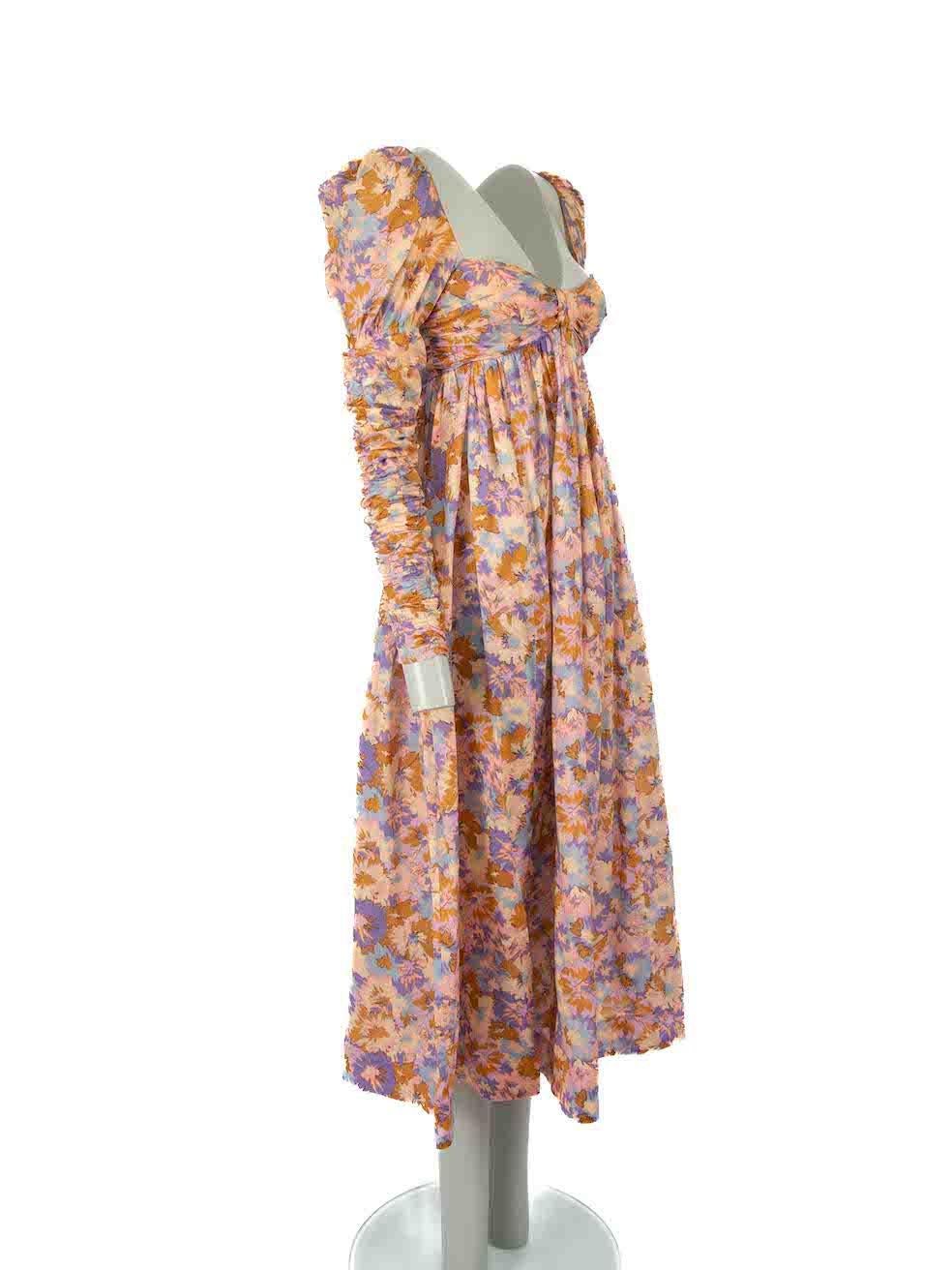 CONDITION is Very good. Minimal wear to dress is evident. Minimal white stains to left sleeve on this used Zimmermann designer resale item.

Details
Multicolour
Cotton
Dress
Floral pattern
Midi
Sweetheart neckline
Ruched long sleeves
2x Side