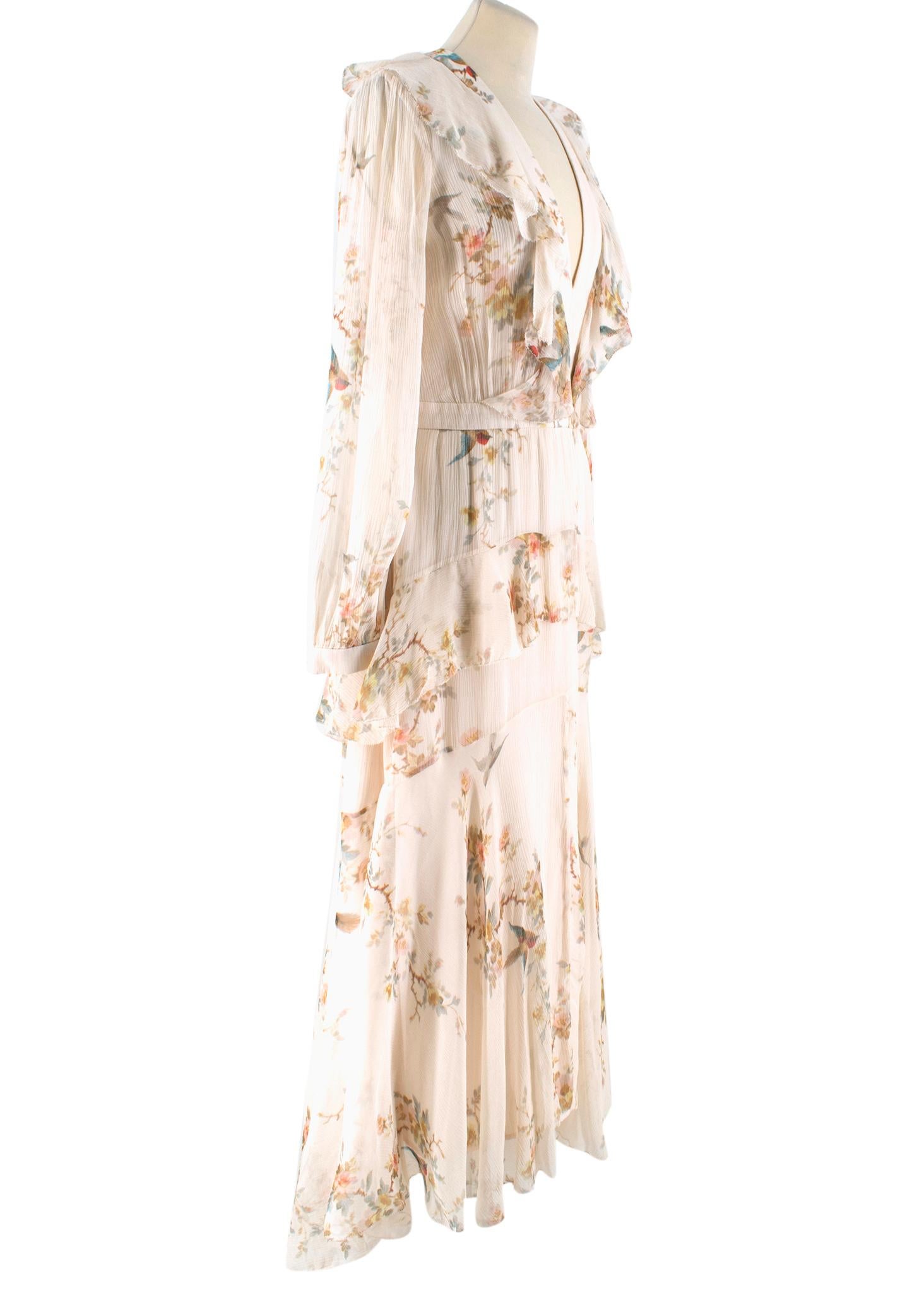 Zimmermann Floral-print Ruffled Silk Maxi Dress

- Beige floral print silk maxi dress
- Lightweight
- Ruffled-trimmed
- Plunging v-neck
- Long sheer sleeves, buttoned cuffs 
- Centre-back hook-and-eye and zip fastening
- Ruched waist
- Flowy skirt