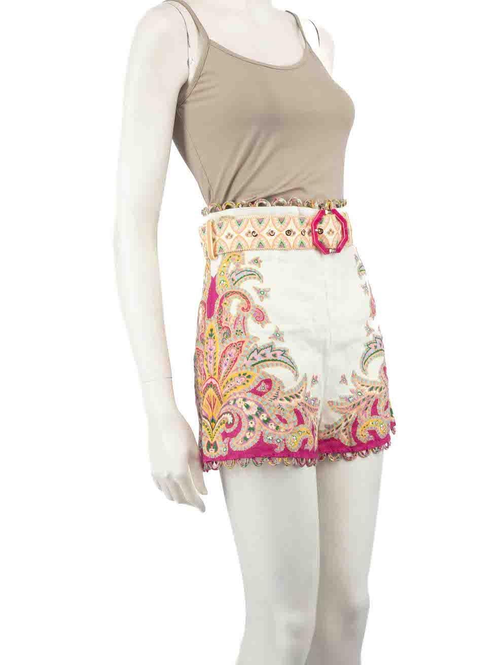 CONDITION is Very good. Minimal wear to shorts is evident. Minimal discoloured mark to rear hip on this used Zimmermann designer resale item.
 
 Details
 Multicolour - white and pink
 Linen
 Shorts
 Belted
 Floral pattern
 Back zip fastening
 Lace
