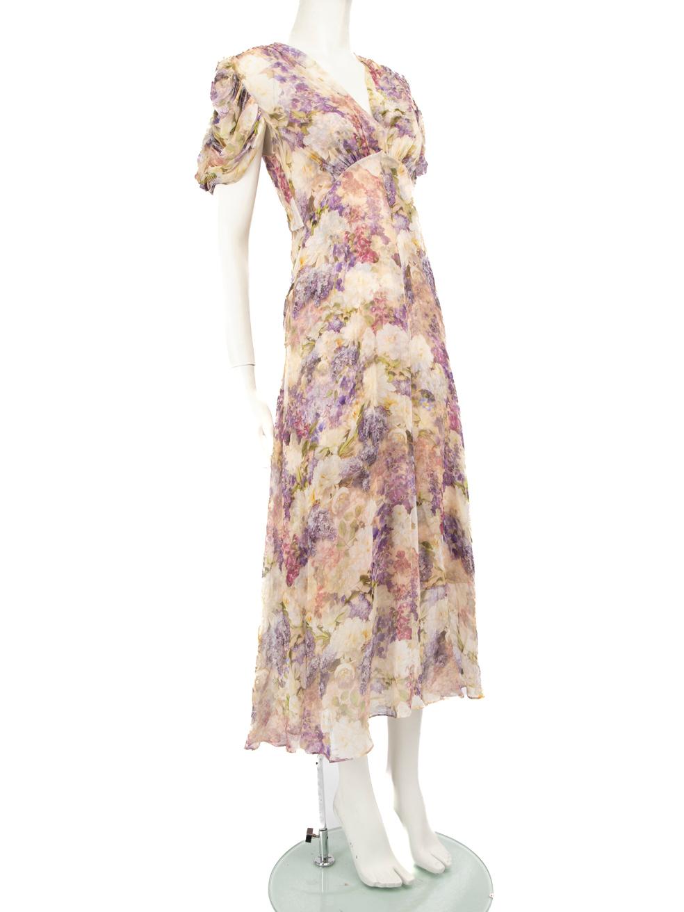 CONDITION is Very good. Hardly any visible wear to dress is evident on this used Zimmermann designer resale item. Includes underdress.
 
 Details
 Multicolour- purple, beige
 Silk
 Dress
 Floral print
 Maxi
 See through
 V-neck
 Short puff sleeves
