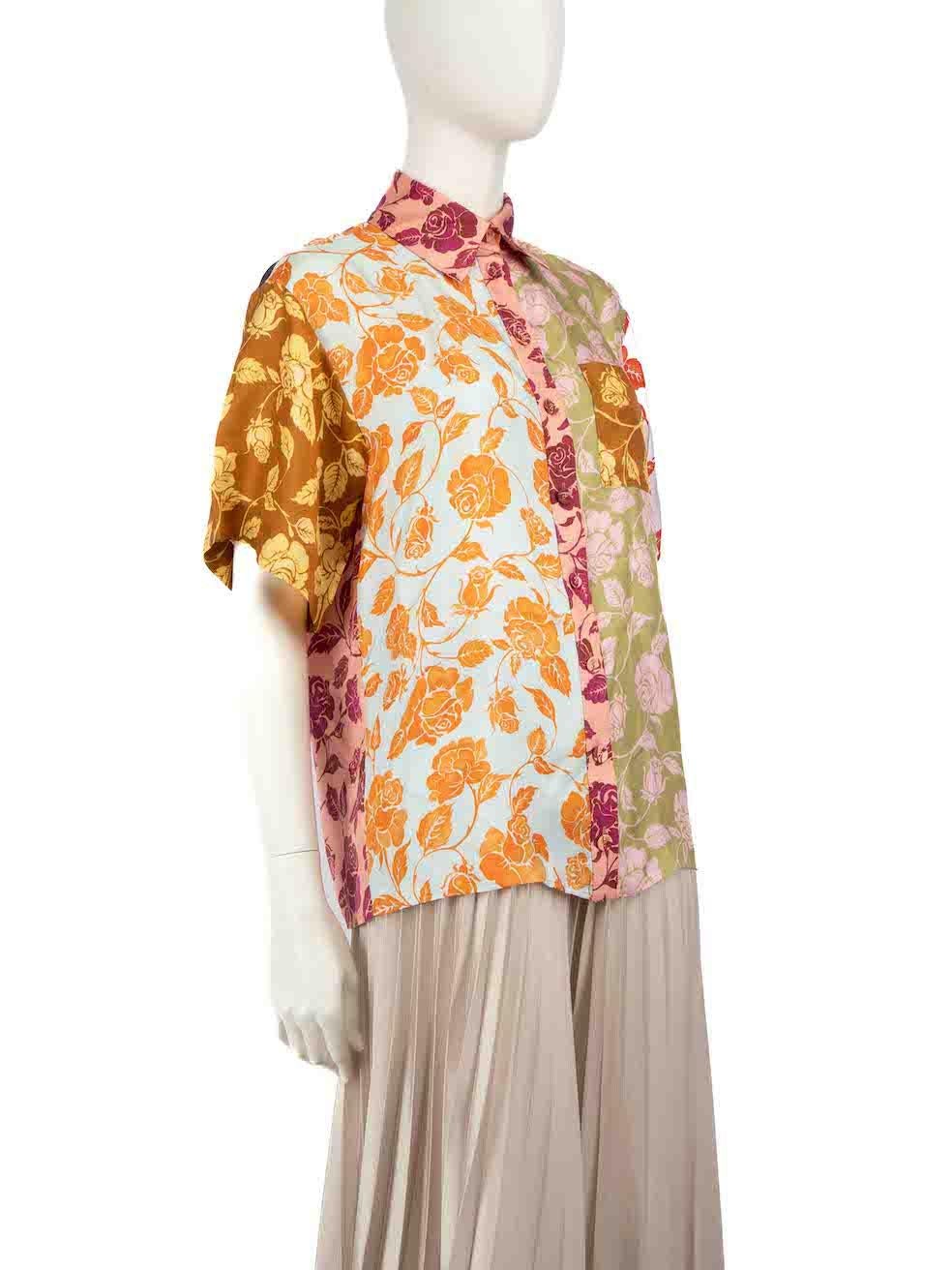 CONDITION is Good. Minor wear to shirt is evident. Light pull thread to weave right sleeve on this used Zimmermann designer resale item.
 
 
 
 Details
 
 
 Multicolour- pink tone
 
 Silk
 
 Shirt
 
 Floral pattern
 
 Short sleeves
 
 Button up