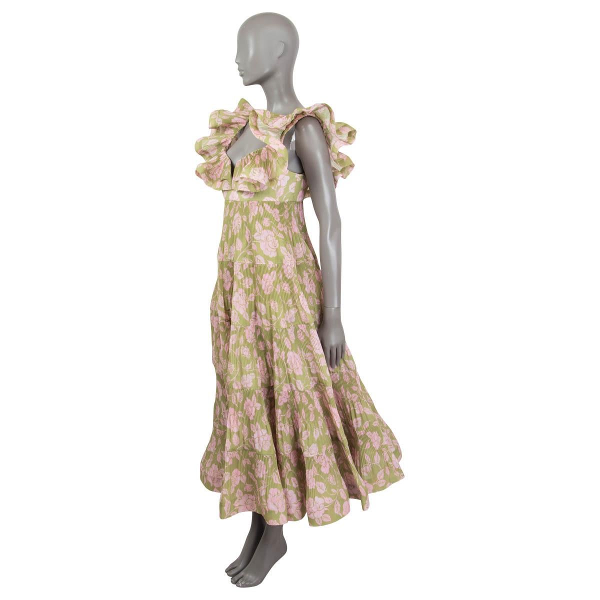 100% authentic Zimmermann The Lovestruck pleated ruffle maxi gown in olive green and light pink polyester (100%). Opens with a zipper on the back. Lined in green cotton (100%). Has been worn and is in excellent condition. 

Resort