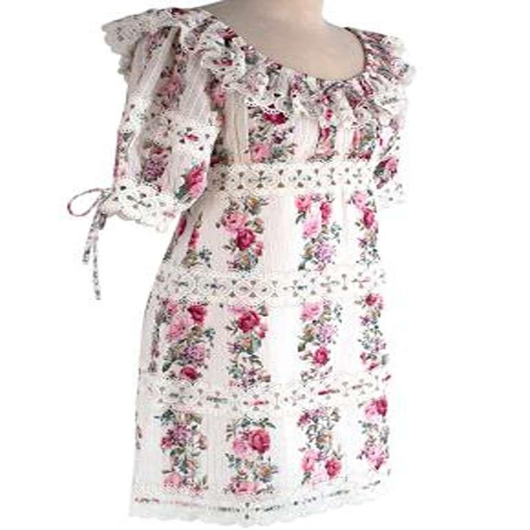 Zimmermann Honour Floral Print Mini Dress

- stretch neckline - can be worn off-shoulder 
- Perfect fitting dress.
- Pink floral print.
- Frilled collar and sleeves. 
- Floral patterns.
- Mid length sleeves.

Made in China. 
Dry clean