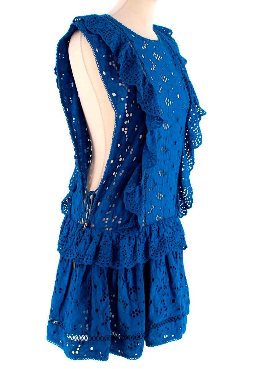 Zimmermann Hyper Eyelet Electric Blue Broderie Anglaise Mini Dress

- Eyecatching electric blue cotton mini dress
- All over Broderie Anglaise, with ruffles running down the bodice and around the waistline
- Deep armholes with ties, and slight