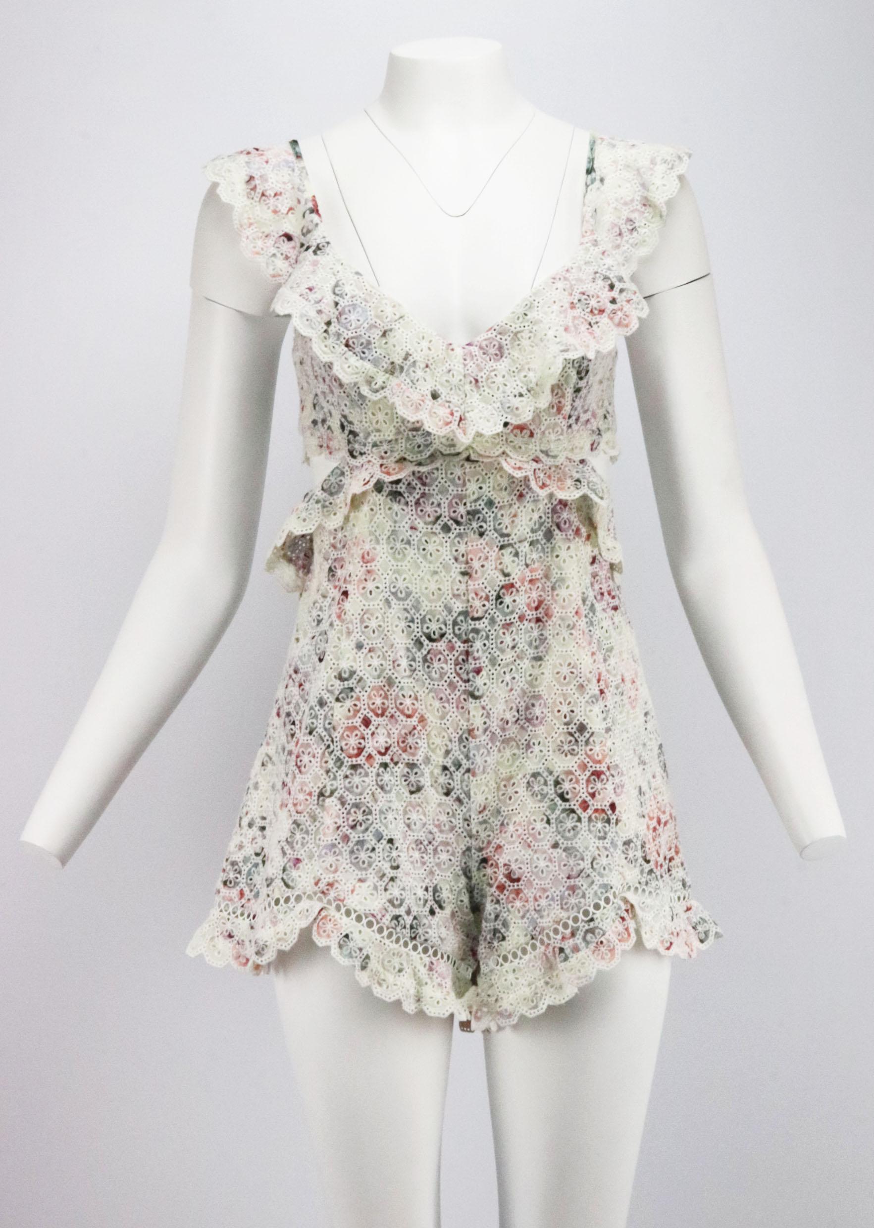 This Jasper playsuit by Zimmermann is made from intricate broderie anglaise cotton and fully lined for coverage, it has flouncy ruffled trims and a cutout at the back topped with a beautiful floral print throughout.
Multi broderie anglaise