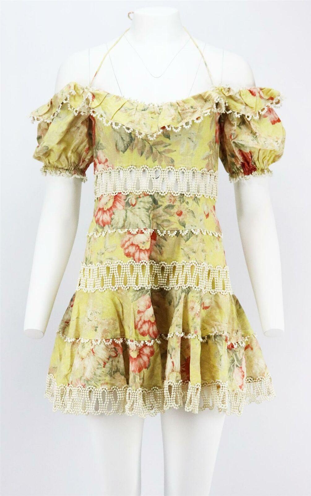 This Maya Java dress by Zimmermann has been woven from airy linen and cotton-blend and is panelled with crochet that reveals just a hint of skin, the slim halterneck strap keeps the off-the-shoulder neckline perfectly in place.
Yellow linen and