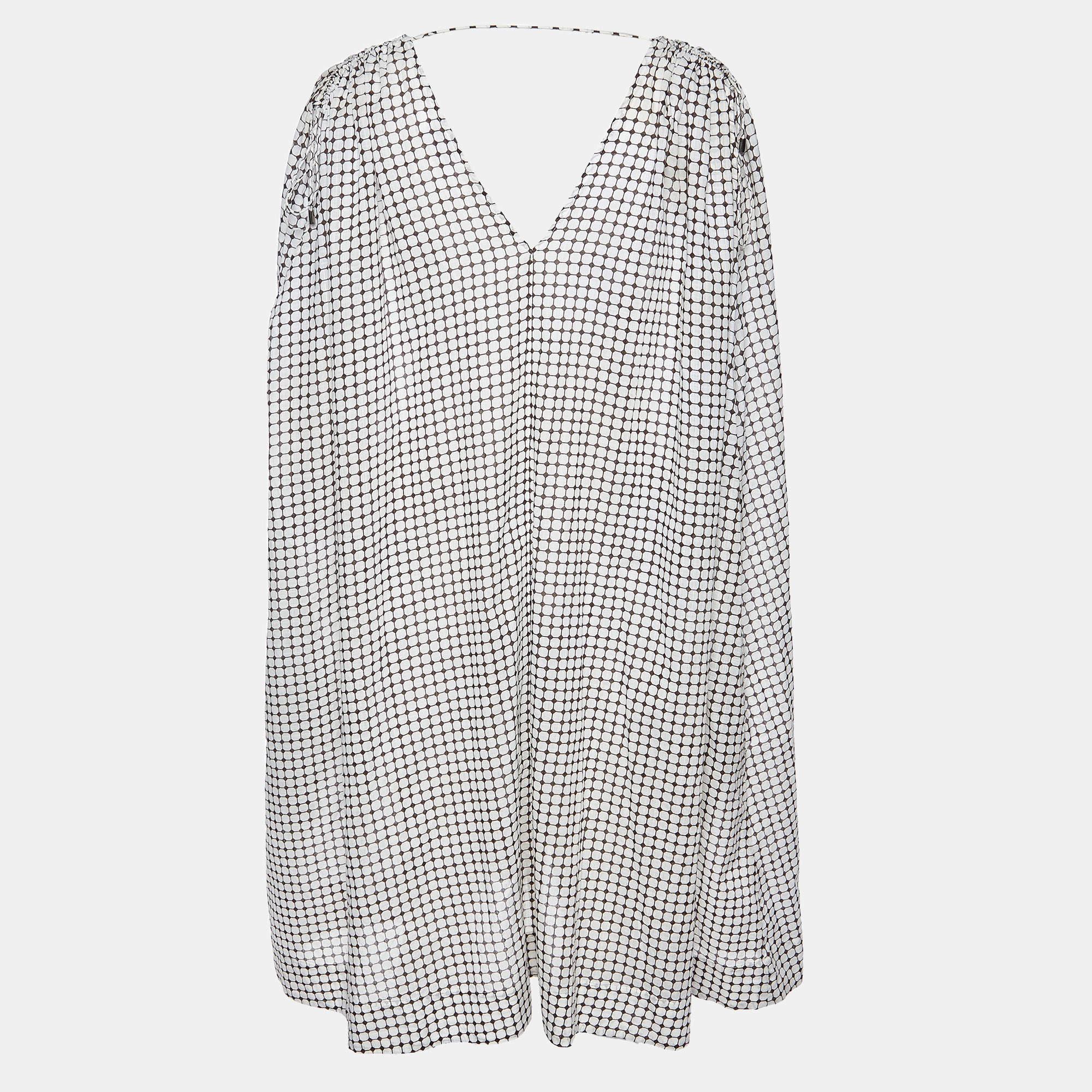 Embrace the best of vacation style with this kaftan dress from Zimmermann. It comes in check patterns and has a comfortable fit.