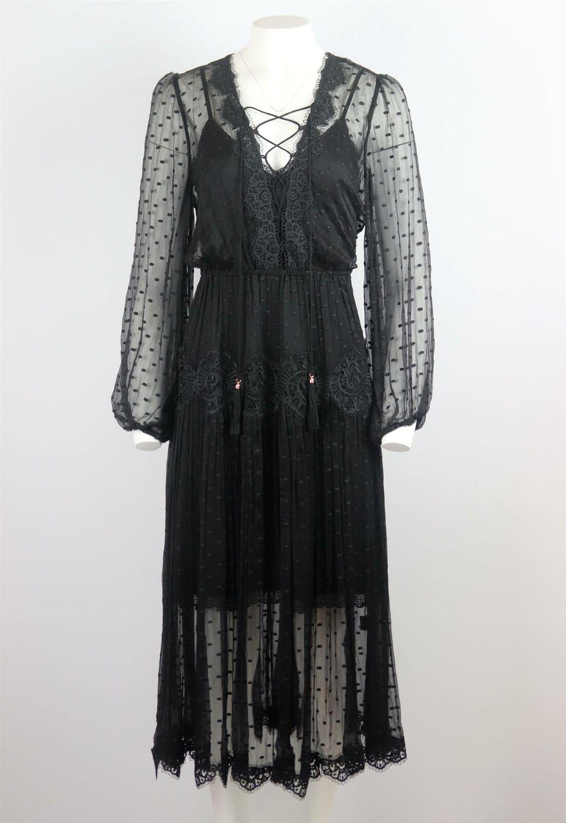 This beautiful Oleander dress by Zimmermann has be trimmed with delicate lace and detailed with swiss-dot embroidered silk-georgette and finished with a slip and lace-up detail at the front.
Black lace, black silk-georgette.
Slips on.
100% silk;