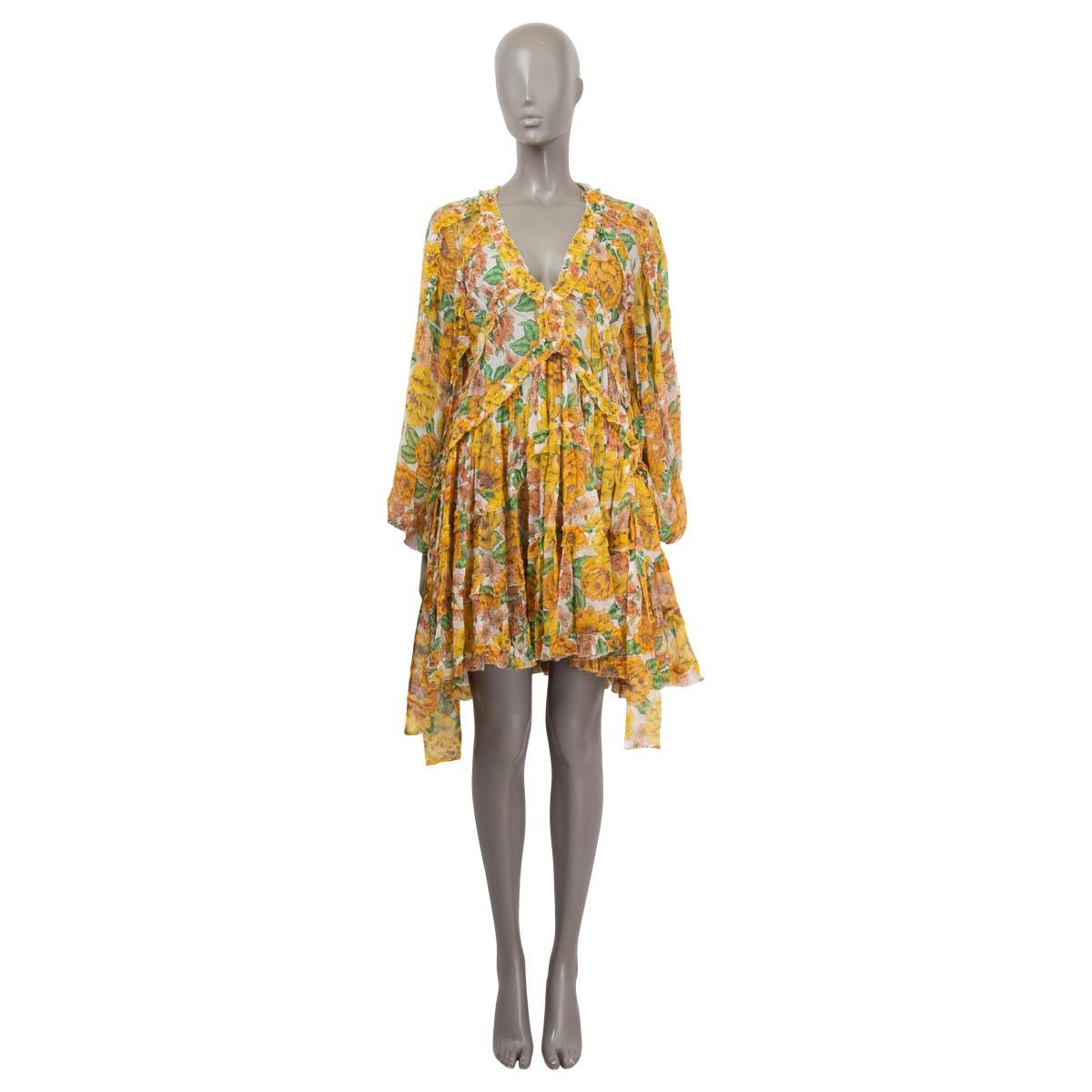 100% authentic Zimmermann floral poppy chiffon dress in yellow, orange and green silk (100%) with a loose fit, flowy fabric, V-neckline, a detailed ruffled hemline, 3/4 sleeves and elastic sleeve cuffs. Comes with a slip-dress underneath with