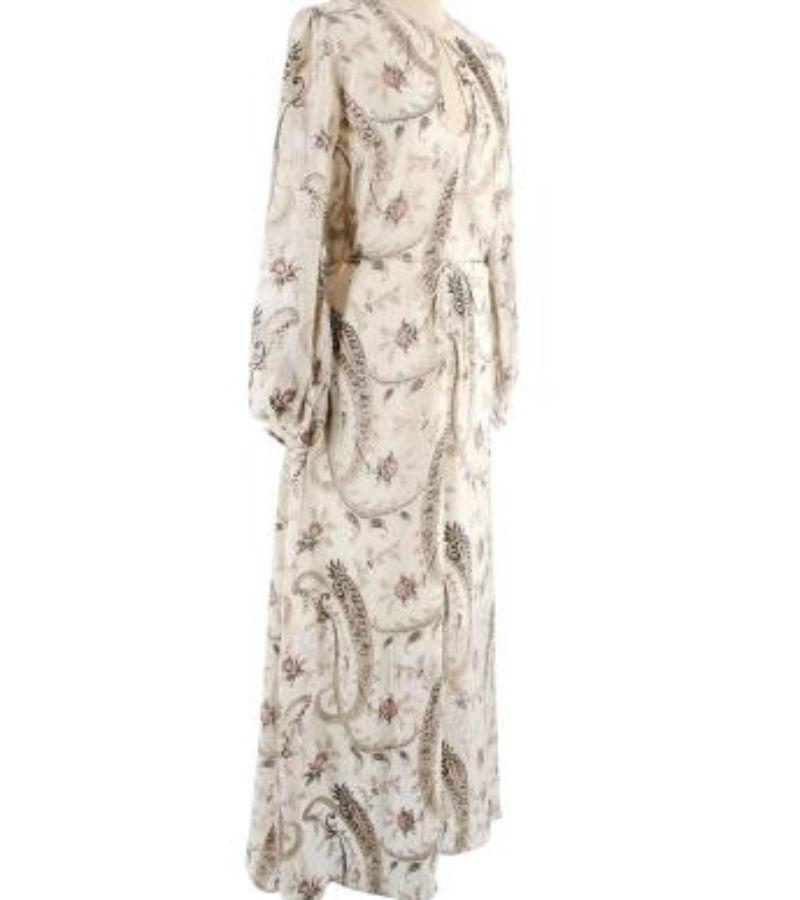 Zimmerman Patterned Sheer Long Dress

- Concealed zip fastening at the side
- Self-tie fastening around the waist
- Fully lined
- Shoulder zip fastening
- Full length
- Buttoned cuffs
- Chest key hole

Material
55% Silk, 45% Viscose
Lining: 100%