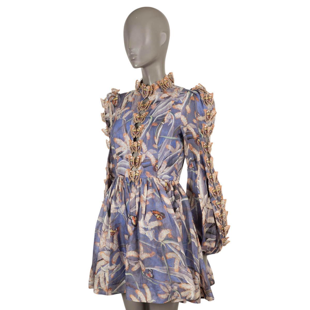 100% authentic Zimmermann Wild Botanica Butterfly mini dress in purple linen (52%) and silk (48%). Features a fit and flare silhouette, butterfly applications on the front and along the bishop sleeves. Opens with a concealed zipper in the back and