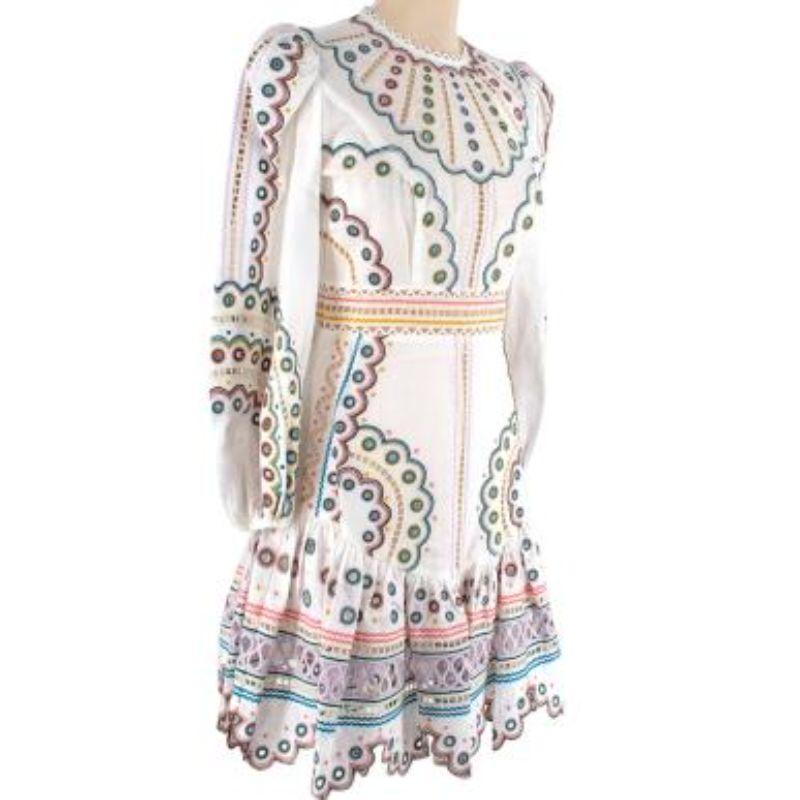 Zimmermann Peggy Embroidered Mini Dress
 

 - Made of linen.
 - skater style
 - multicolour embroidery
 - scalloped hem
 

 Made in China.
 Dry clean only.
 

 PLEASE NOTE, THESE ITEMS ARE PRE-OWNED AND MAY SHOW SIGNS OF BEING STORED EVEN WHEN
