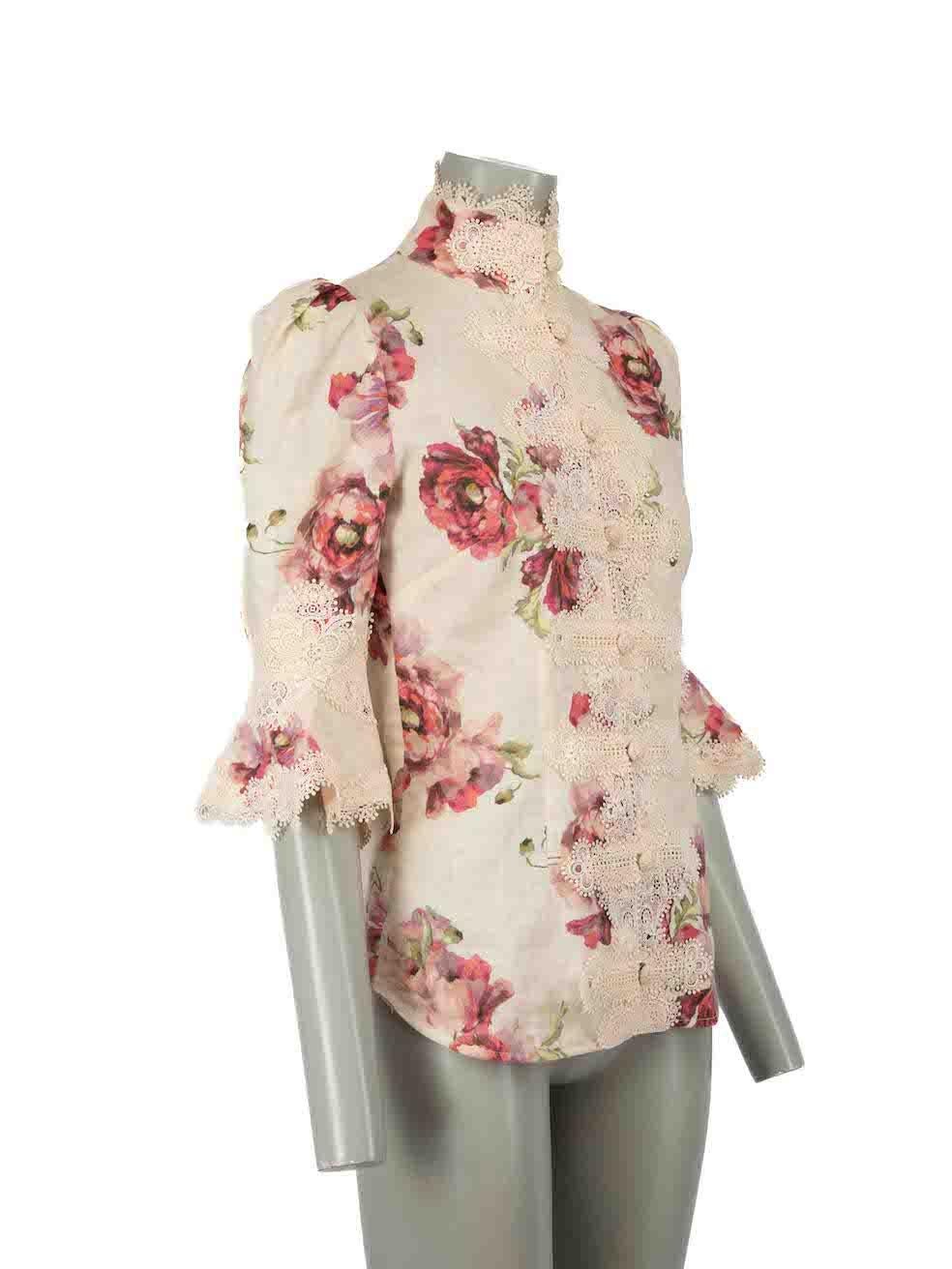 CONDITION is Very good. Minimal wear to blouse is evident. Minimal stains to rear and discolouration to internal neckline on this used Zimmermann designer resale item.
 
Details
Pink
Linen
Blouse
Floral print
Lace trim
Mock neck
Button