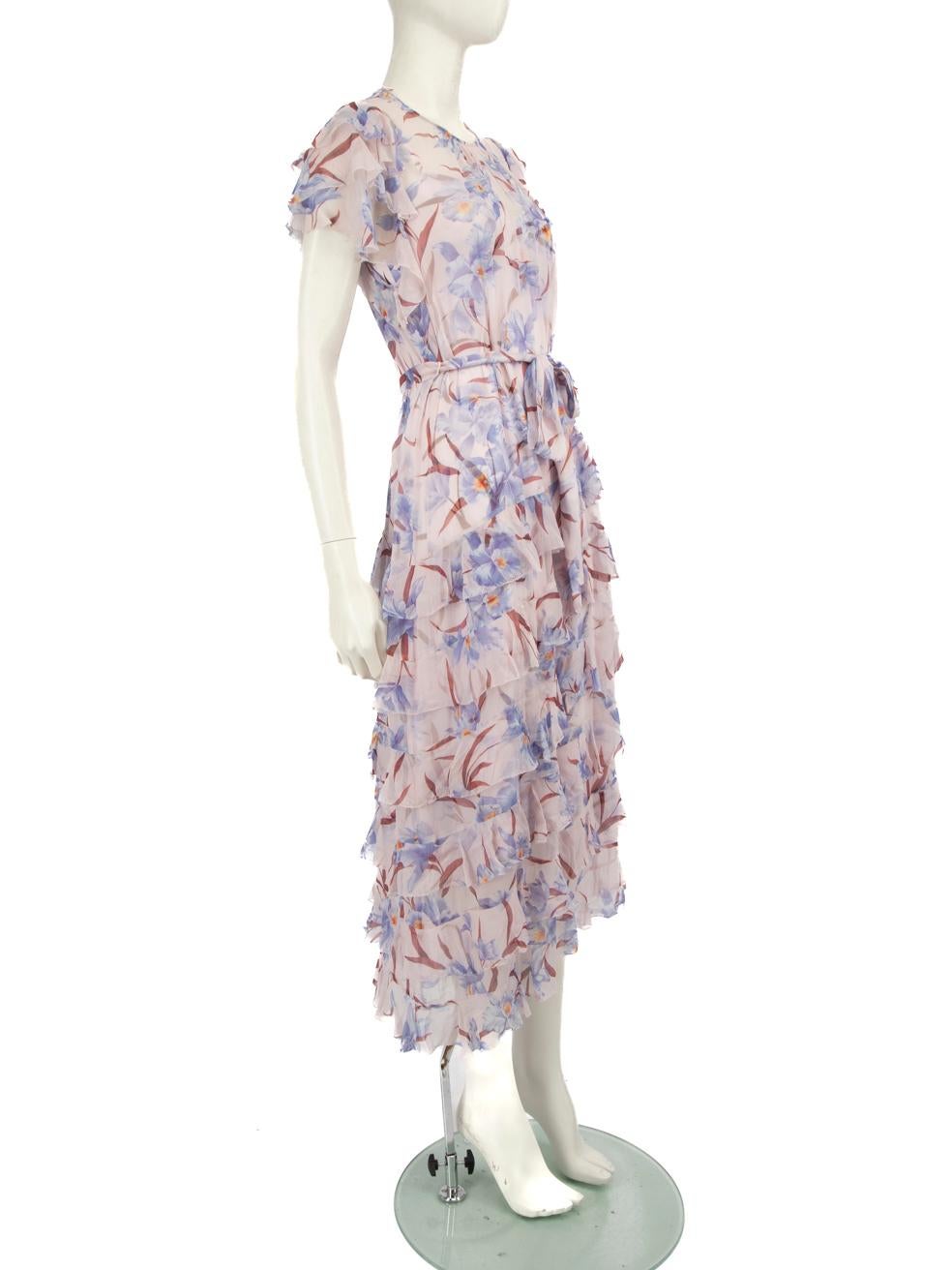 CONDITION is Good. Minor wear to dressis evident. Light discolouration to the rear bottom and rear right and rear bottom of the slip dress. The dress is seen with pulls to the weave in the front and above the hemline on this used Zimmermann designer