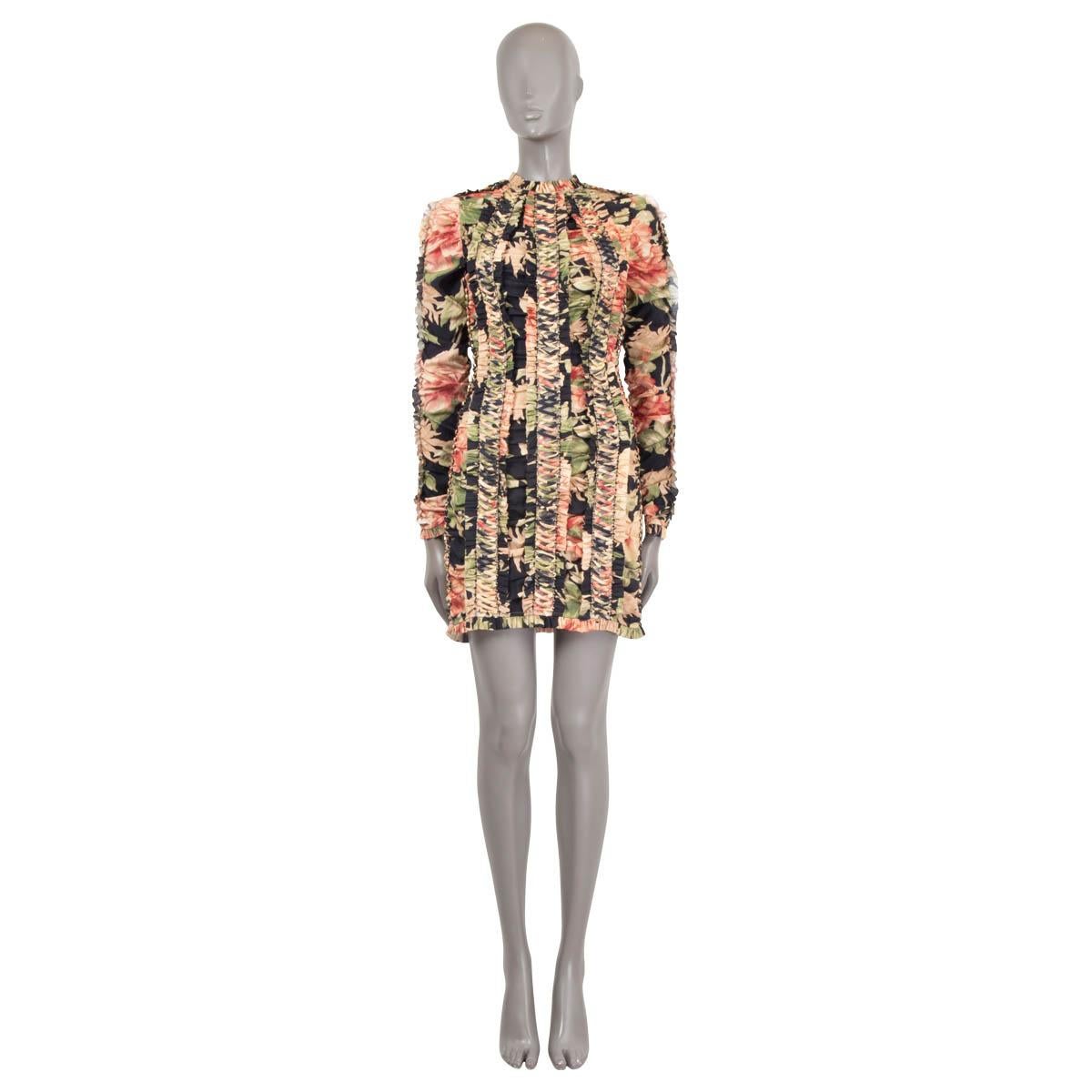 100% authentic Zimmermann Espionage lace-up pencil mini dress in black stretch-silk (with 7% elastane) and floral-print in pink, nude and green. Features lace-up panels which are outlined with delicate ruffles. Closes with a concealed zipper in the