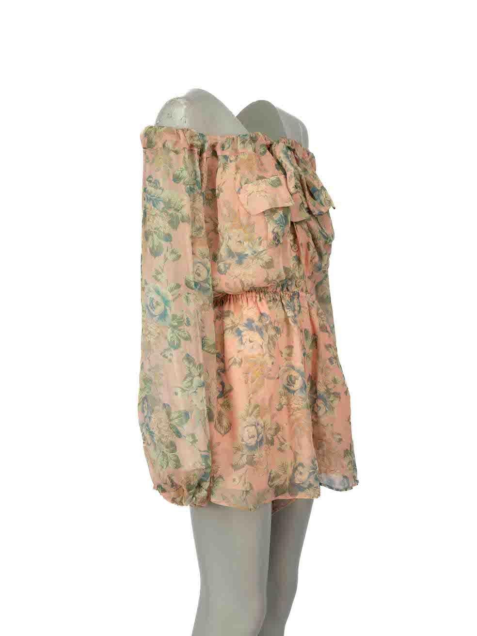 CONDITION is Very good. Hardly any visible wear to playsuit is evident on this used Zimmermann designer resale item.
  
Details
Pink
Silk
Playsuit
Elasticated off-the-shoulder
Floral pattern
Long sleeves
Elasticated cuffs and waist
Button up