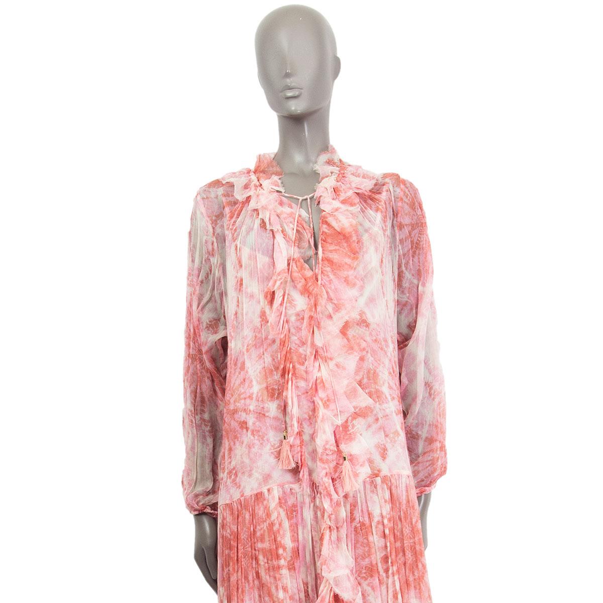 authentic Zimmermann batik dress in brick, rose and off-white silk-chiffon (100%) with a loosely fit, flowy fabric, V-neckline, detailed ruffled hemline, long sleeves, elastic sleeve cuffs and a cut-out in the front. Lined in a fitted underdress