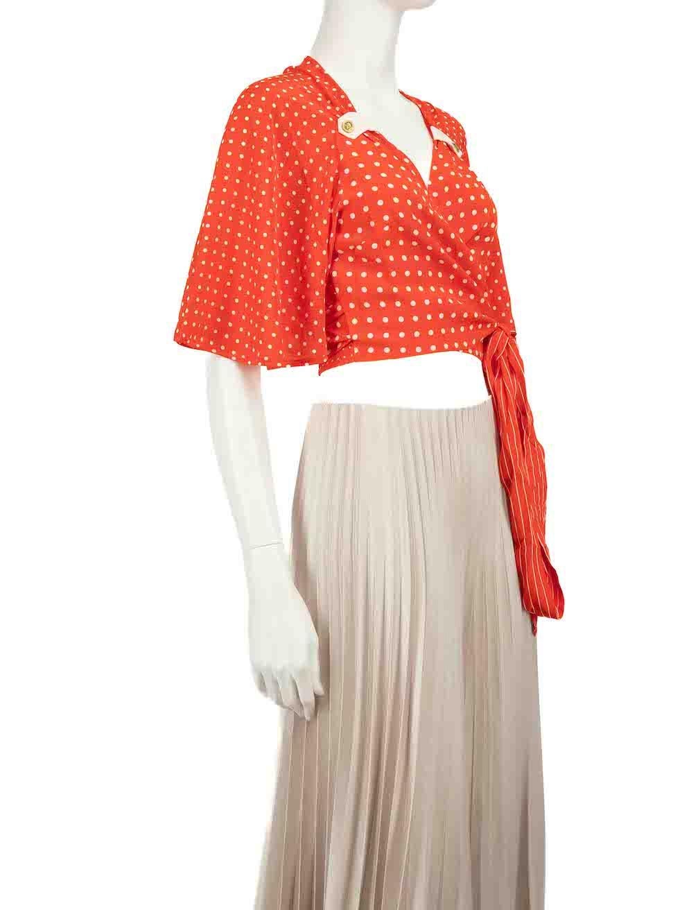 CONDITION is Never worn. No visible wear to wrap top is evident on this new Zimmermann designer resale item.
 
 
 
 Details
 
 
 Red
 
 Silk
 
 Mid sleeves top
 
 Polkadot pattern
 
 Wrap tie around closure
 
 V neckline
 
 Cropped length
 
 
 
 
 
