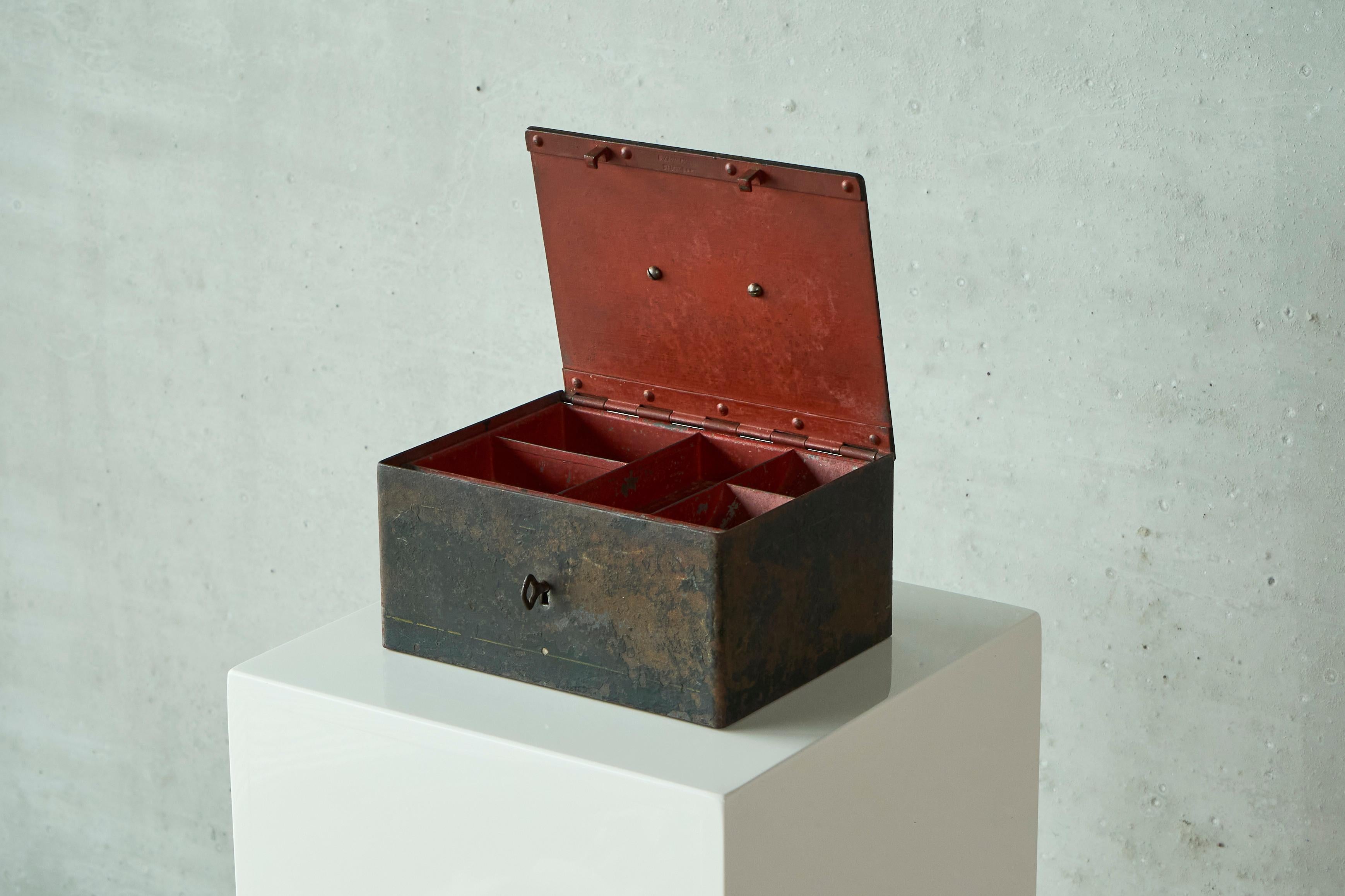 Zimmermann Stuttgart Iron Box in Patinated Metal 1930s.

Heavy and beautifully patinated iron box / safe made by the renowned company Zimmermann of Stuttgart in Germany. Early 20th century. 

A wonderful design featuring a nice handle in brass, a