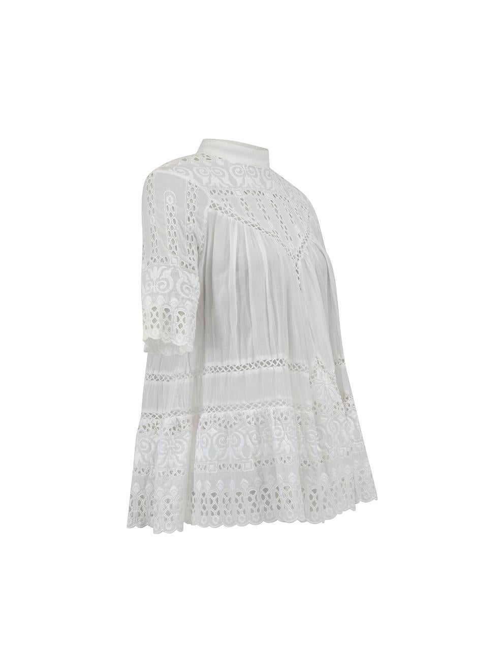 CONDITION is Very good. Minimal wear to top is evident. Minimal wear to the front neckline with small mark and the unravelling of the embroidery on this used Zimmermann designer resale item.

Details
White
Cotton
Sheer
Broderie 1/2 sleeved