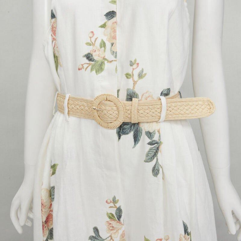 ZIMMERMANN white floral linen raffia braided belt halter backless dress Sz.3 L
Reference: KNLM/A00152
Brand: Zimmermann
Material: Linen
Color: White
Pattern: Floral
Closure: Button
Lining:  Cotton
Extra Details: White linen with floral button.