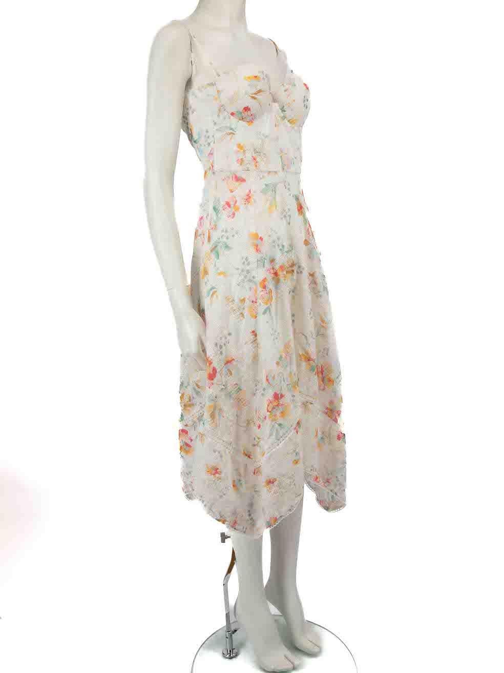 CONDITION is Very good. Minimal wear to dress is evident. Minimal stain mark to cup lining on this used Zimmermann designer resale item.
 
 
 
 Details
 
 
 White
 
 Cotton
 
 Midi dress
 
 Floral print pattern
 
 Sweetheart neckline
 
 Embroidered