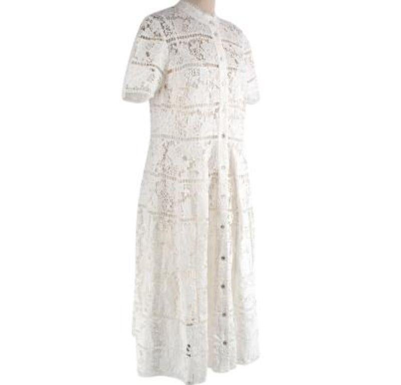 Zimmermann White Guipure Lace Shirt Dress

-Heavy weight midi long sleeve dress
-white slip 
-Concealed zip at the back
-Button up front 
-Elastic sleeve 
Material
-88% polyester 
-12% spandex
(Exclusive trims)

Washing
- Gentle cold hand wash
