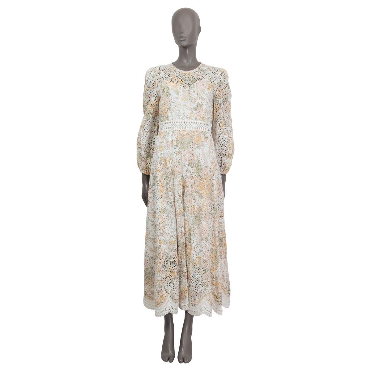 100% authentic Zimmermann cut out detailed dress in off-white, pale green, pale pink and pale orange linen (100%). Features long sleeves, a lace embroidered hemline and a floral print. Opens with a zipper and a hook on the back. Comes with a