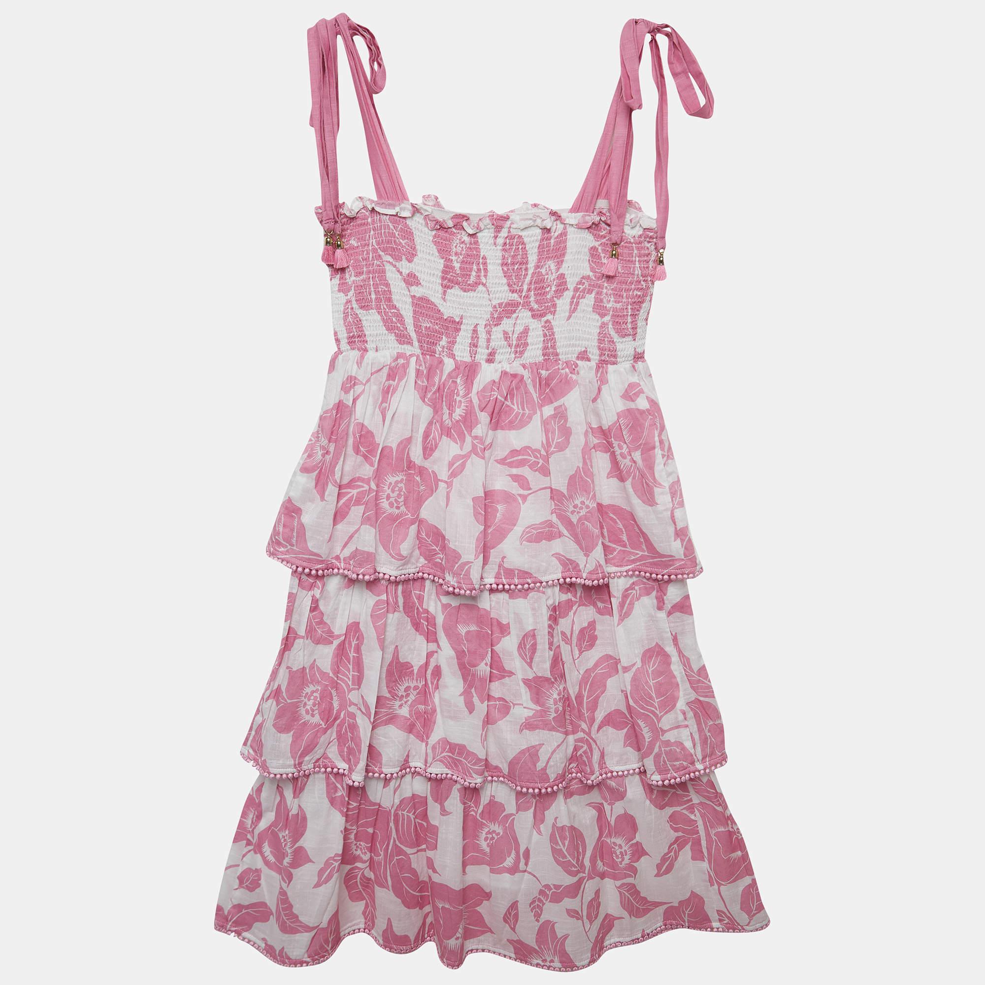 The Zimmermann dress for kids is a vibrant and playful garment featuring a delightful array of colors and patterns. Made from comfortable cotton it boasts a tiered design adding a whimsical touch to this stylish and cheerful childrens dress.