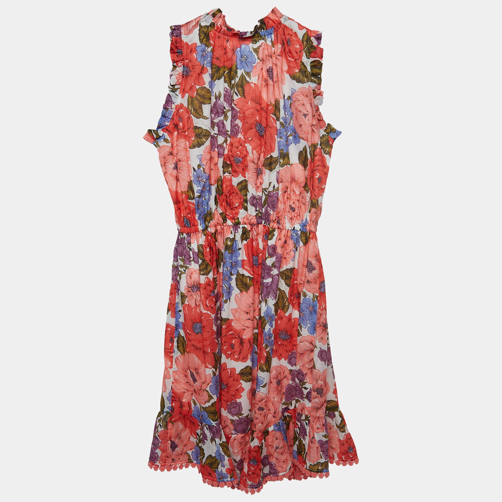 The Zimmermann dress exudes feminine charm with its delicate floral pattern. Crafted from breathable cotton the dress features a flattering silhouette intricate detailing and a harmonious blend of white and pink hues making it a perfect choice for a