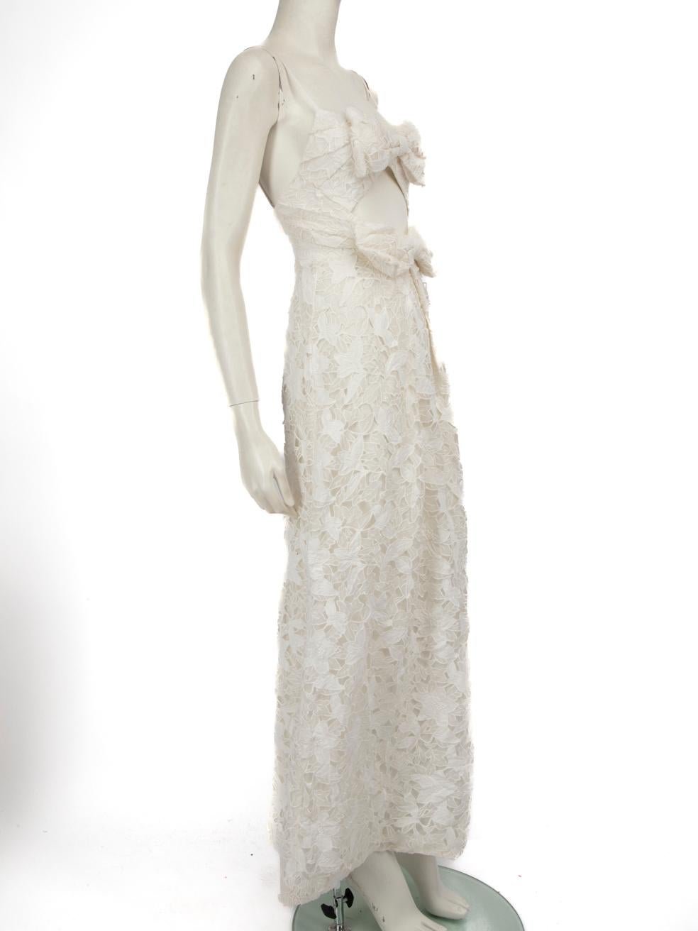 CONDITION is Never worn, with tag. No visible wear to dress is evident on this new Zimmermann designer resale item.
 
 
 
 Details
 
 
 Model: Corsage Bow Dress
 
 White
 
 Silk
 
 Dress
 
 Floral guipure lace
 
 Front bow detail
 
 Front cut out