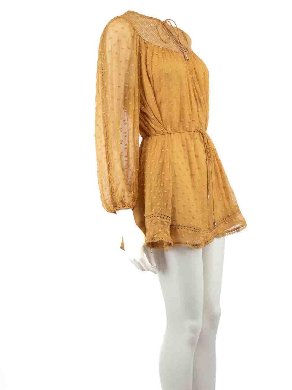 CONDITION is Good. Minor wear to playsuit is evident. Light wear to the fabric surface with a number of plucks to the weave and embroidery threads throughout this used Zimmermann designer resale item.
 
 Details
 Yellow
 Silk
 Playsuit
 Polkadot