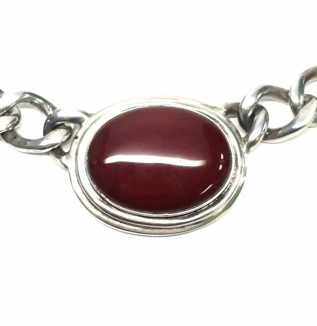 Zina sterling silver thick, heavy curb link chain with large oval brown/red stone that looks like red jadeite. Strong slide clasp and strong, solid, fully soldered shut links. Can be men's or women's piece.

Please check our other listings for