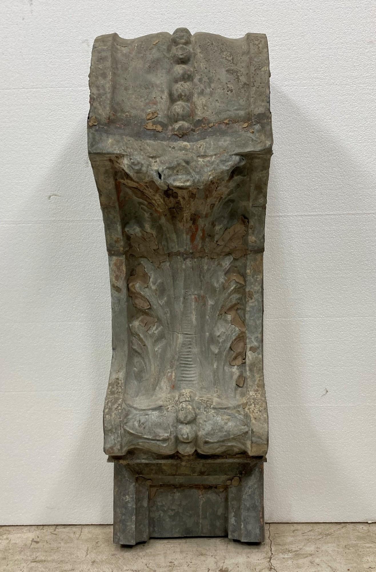 Zinc corbel done with a floral design retrieved from a turn of the century building facade. This is ready to hang on the wall. One available. This can be seen at our 400 Gilligan St location in Scranton, PA.