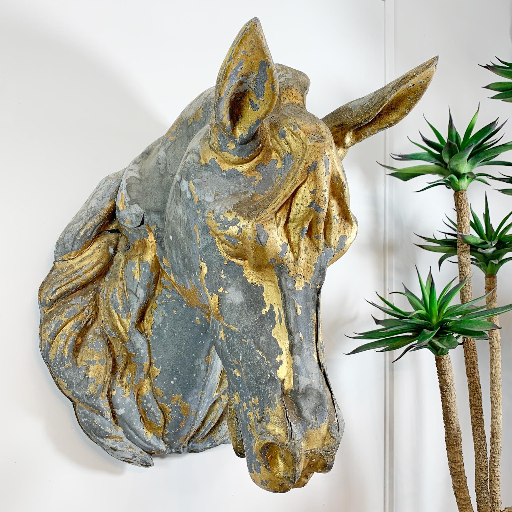 19th century Flemish gilt zinc horse head trade sign. This beautiful hand made sign was used by a Flemish butcher and dates to circa 1860. There are still remnants of the beautiful gilt decoration that would have covered the entire head and mane.