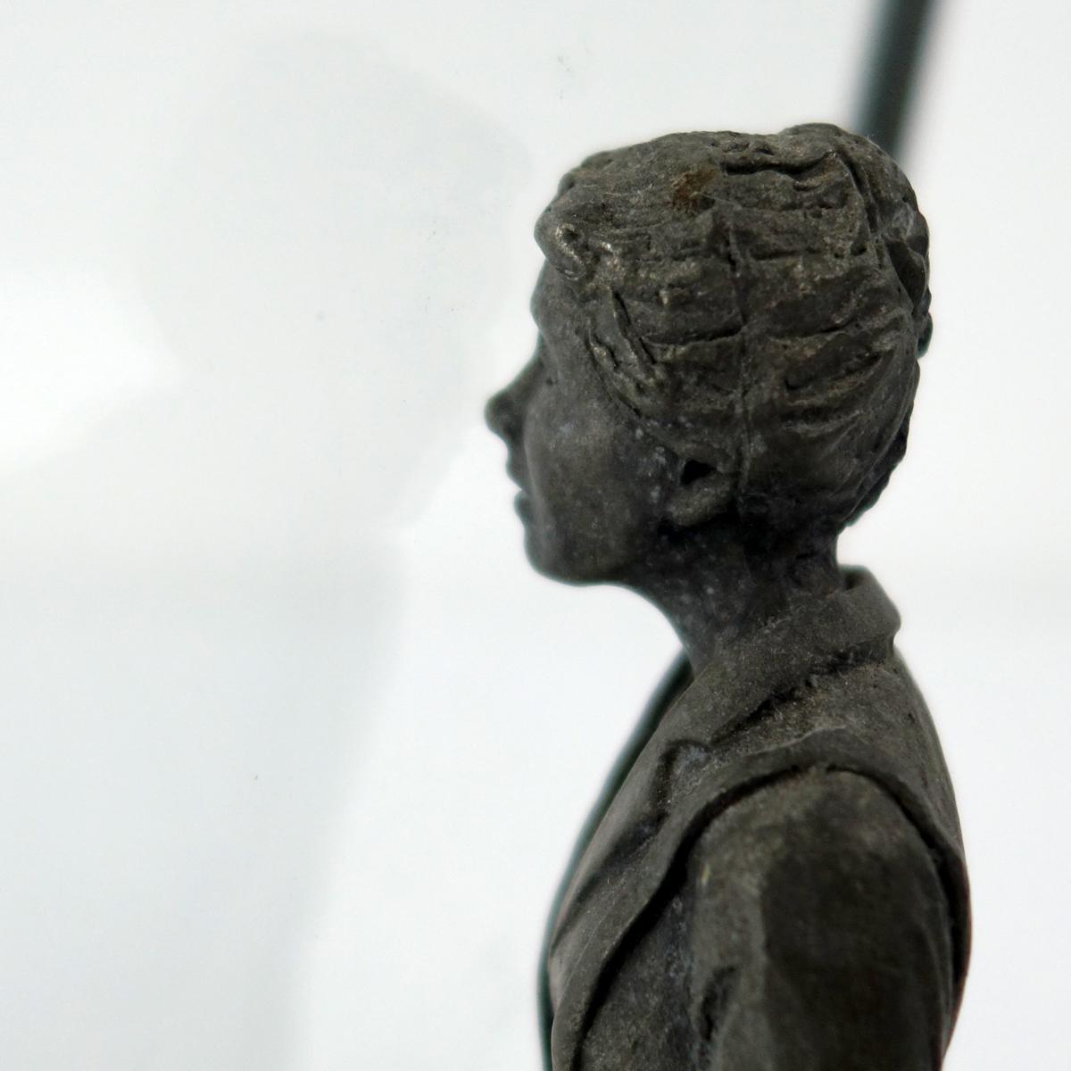 Zinc Statue of a Flemish Lady Who is Window Shopping at UNIC Supermarket For Sale 3