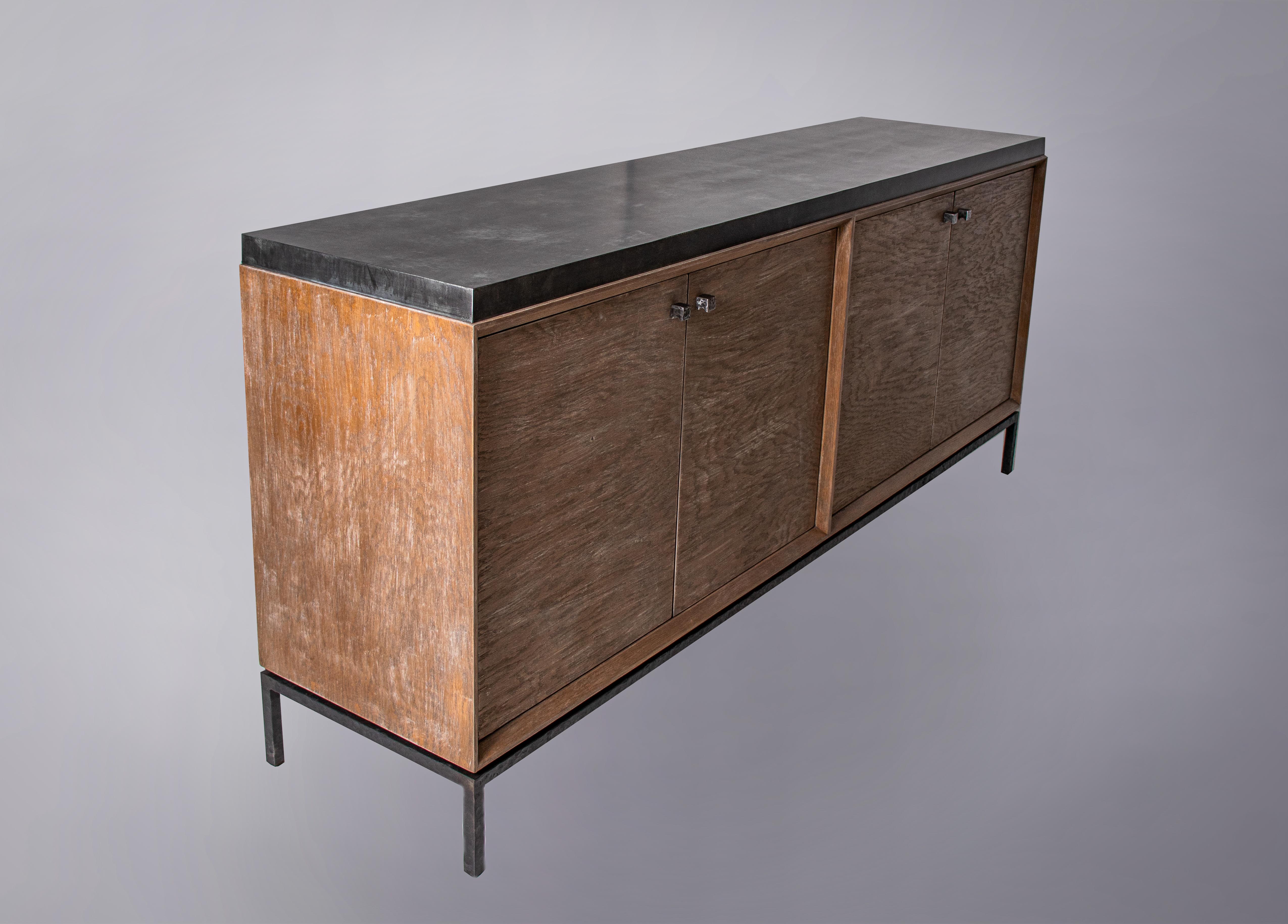 North American Custom aged bronze zinc top four door cabinet with dark hammered steel base. For Sale