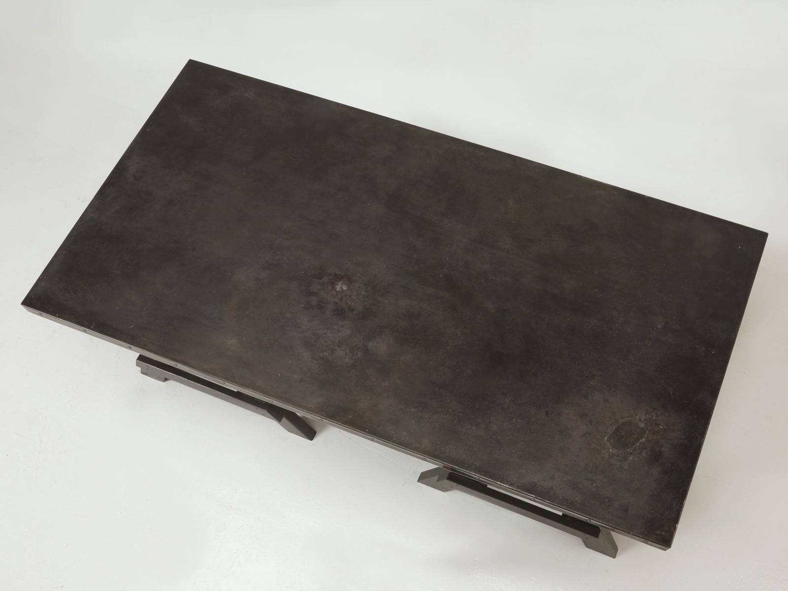 Industrial looking aged Zinc Top Desk, or small Kitchen Table or possible Craft Table. The Zinc Dining Table was carefully aged and clear-coated for protection and mates nicely with a simple rustic pair of sawhorse workshop legs, painted in a solid