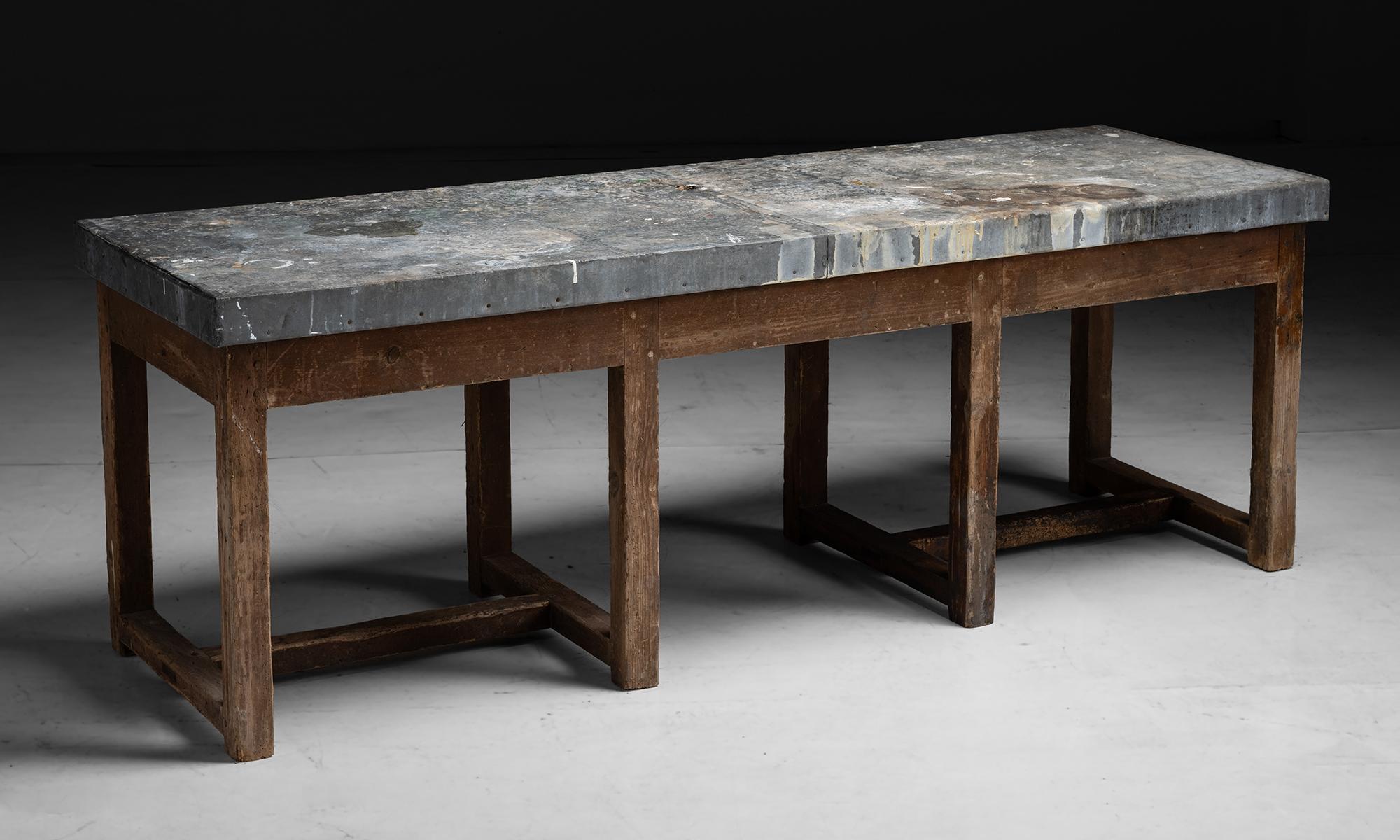 Zinc Work Table

France Circa 1920

Zinc wrapped top with natural patina on eight leg pine base.

79”L x 26”d x 28”h

Ref. TABLE1147